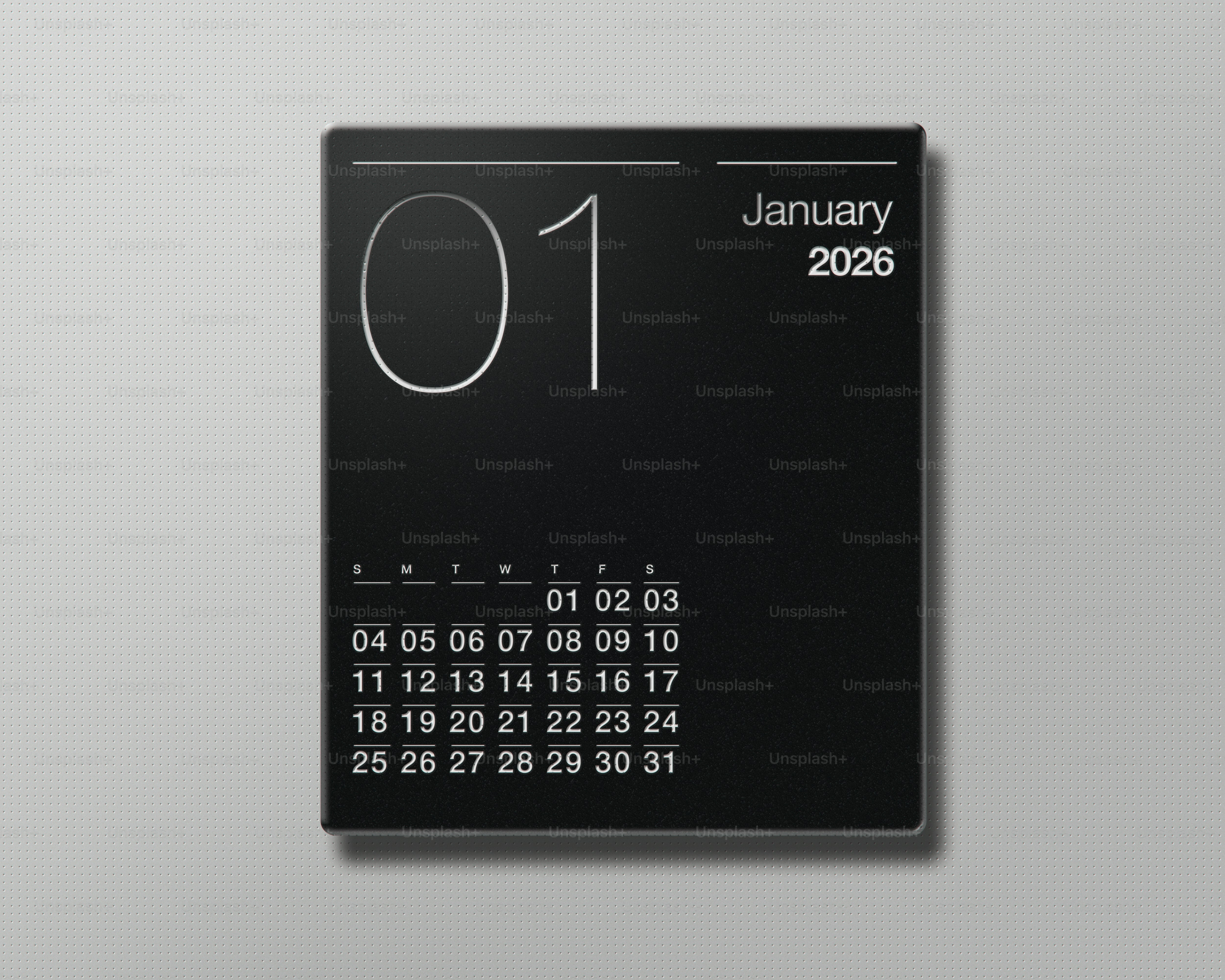 Calendrier noir moderne montrant janvier 2026