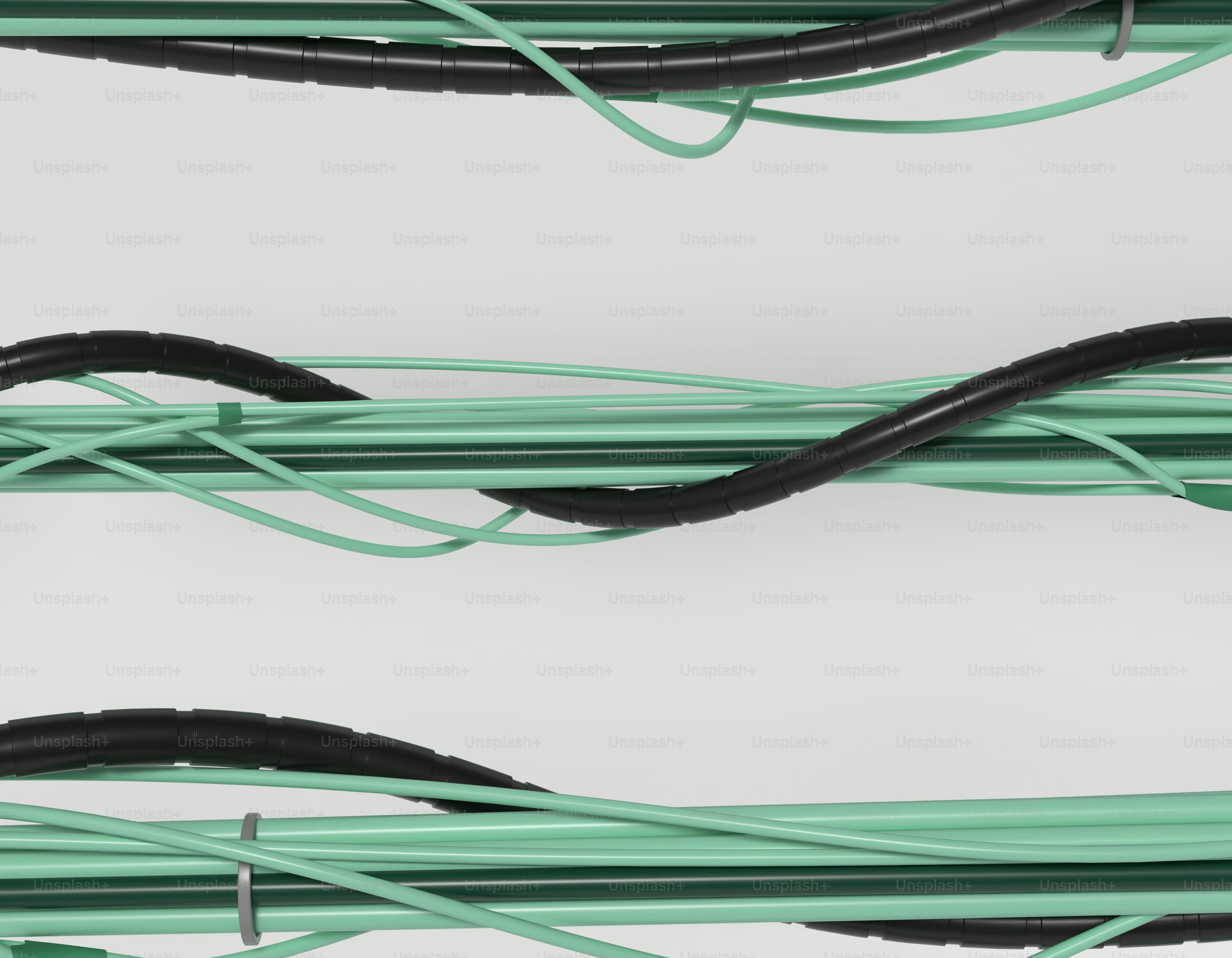 Fios verdes e pretos emaranhados em um fundo branco