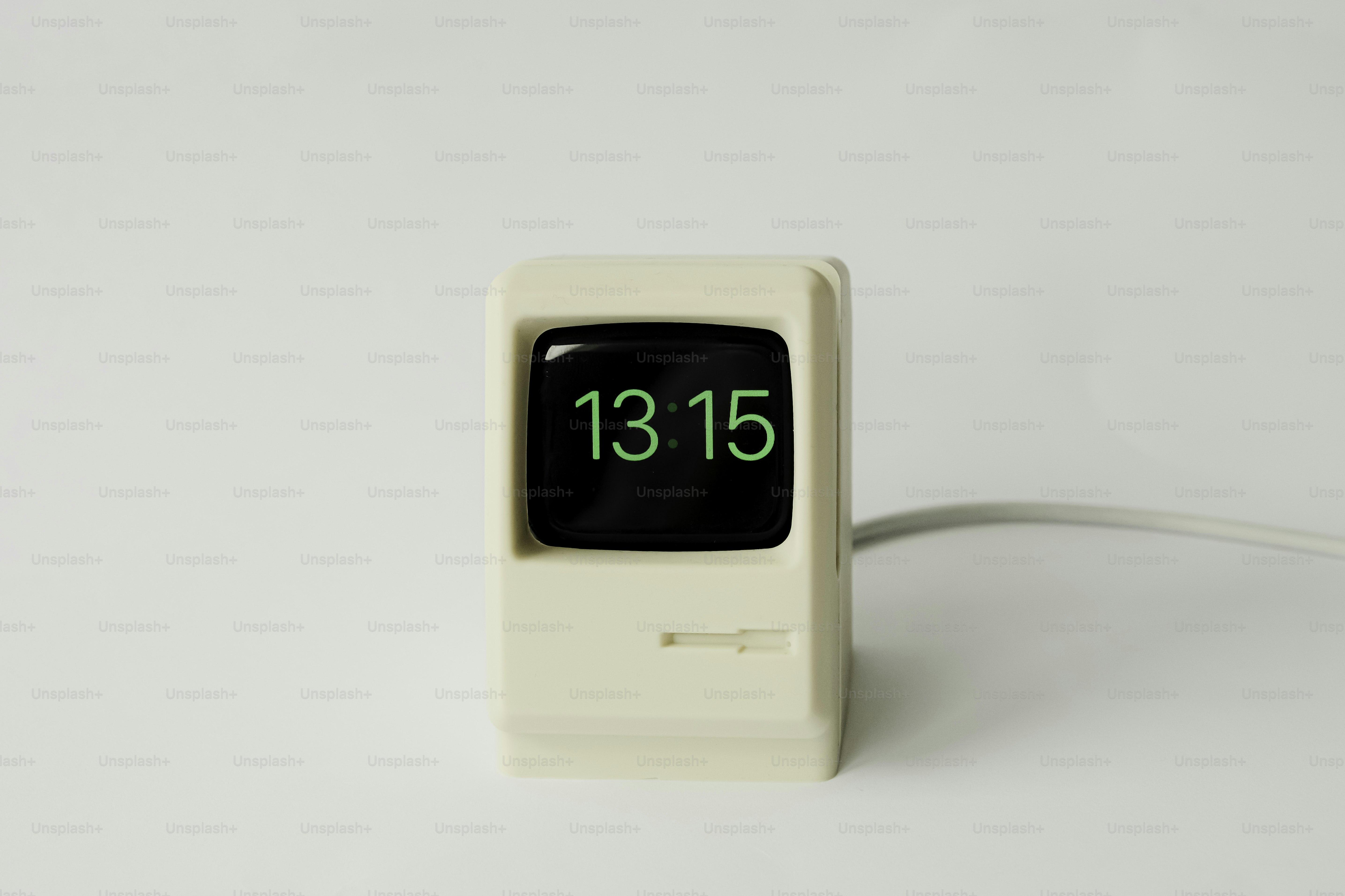 Vintage computer alarm clock showing 13:15