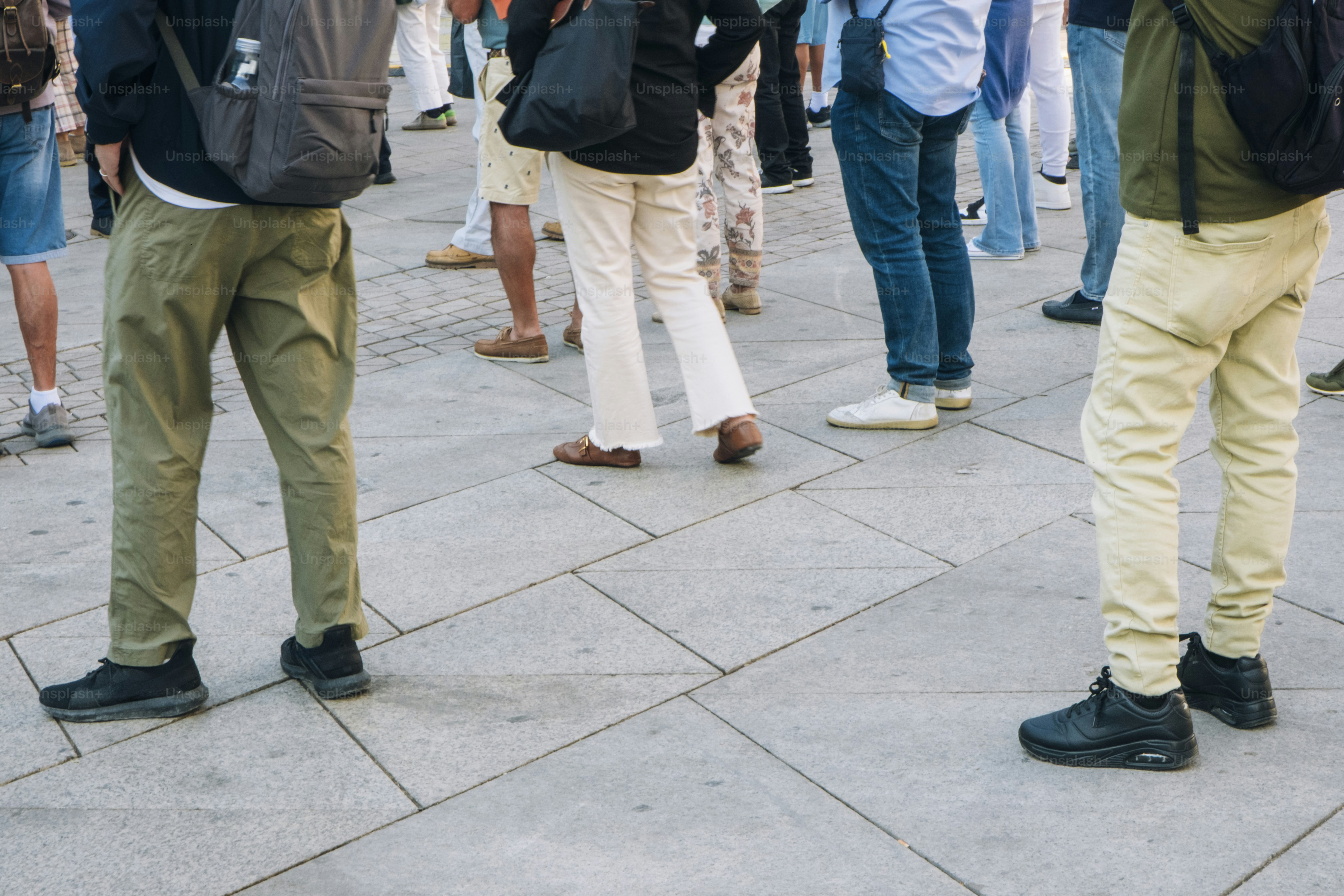 People standing on a stone patio