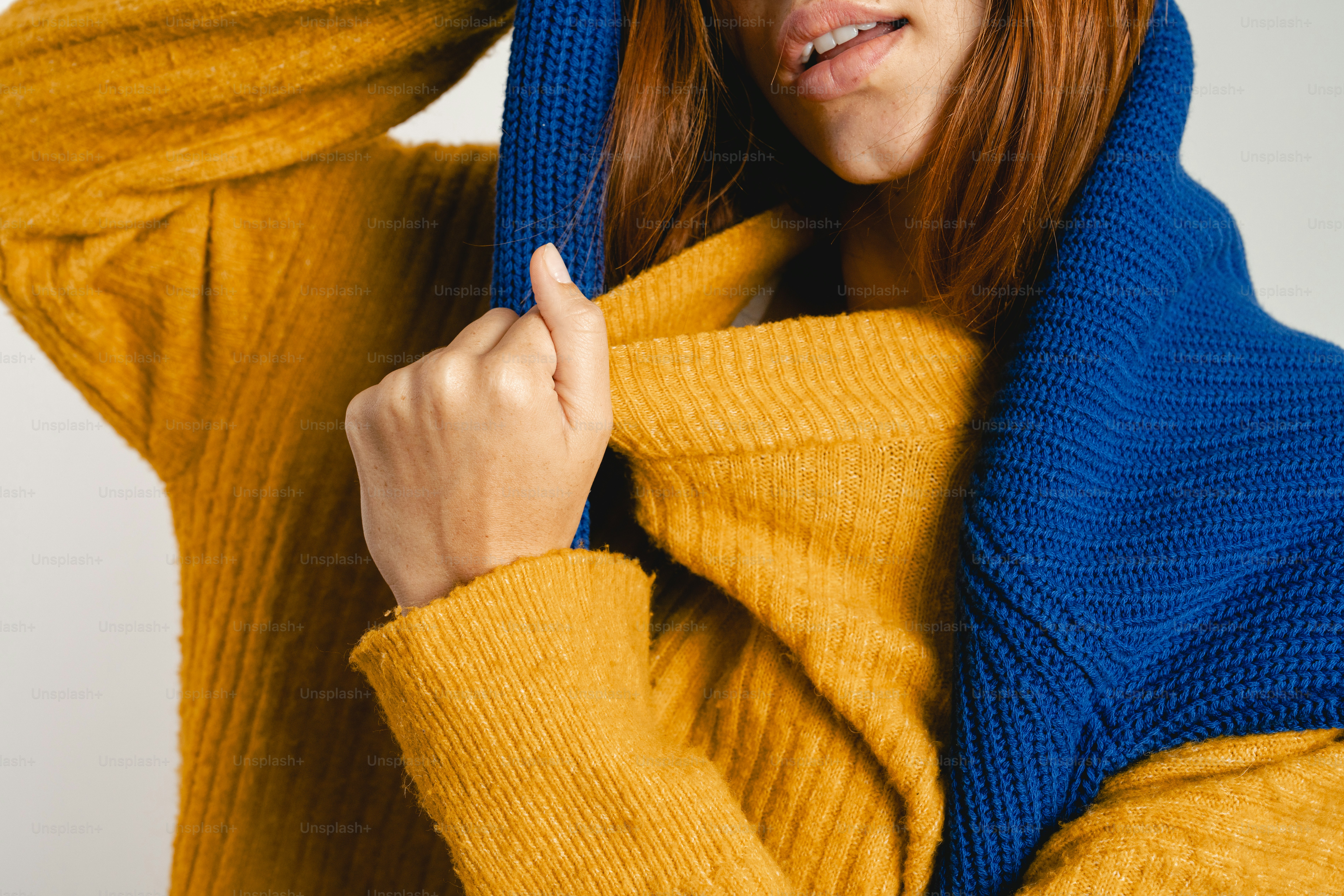 Woman in yellow sweater with blue hood photo – Fashion Image on Unsplash