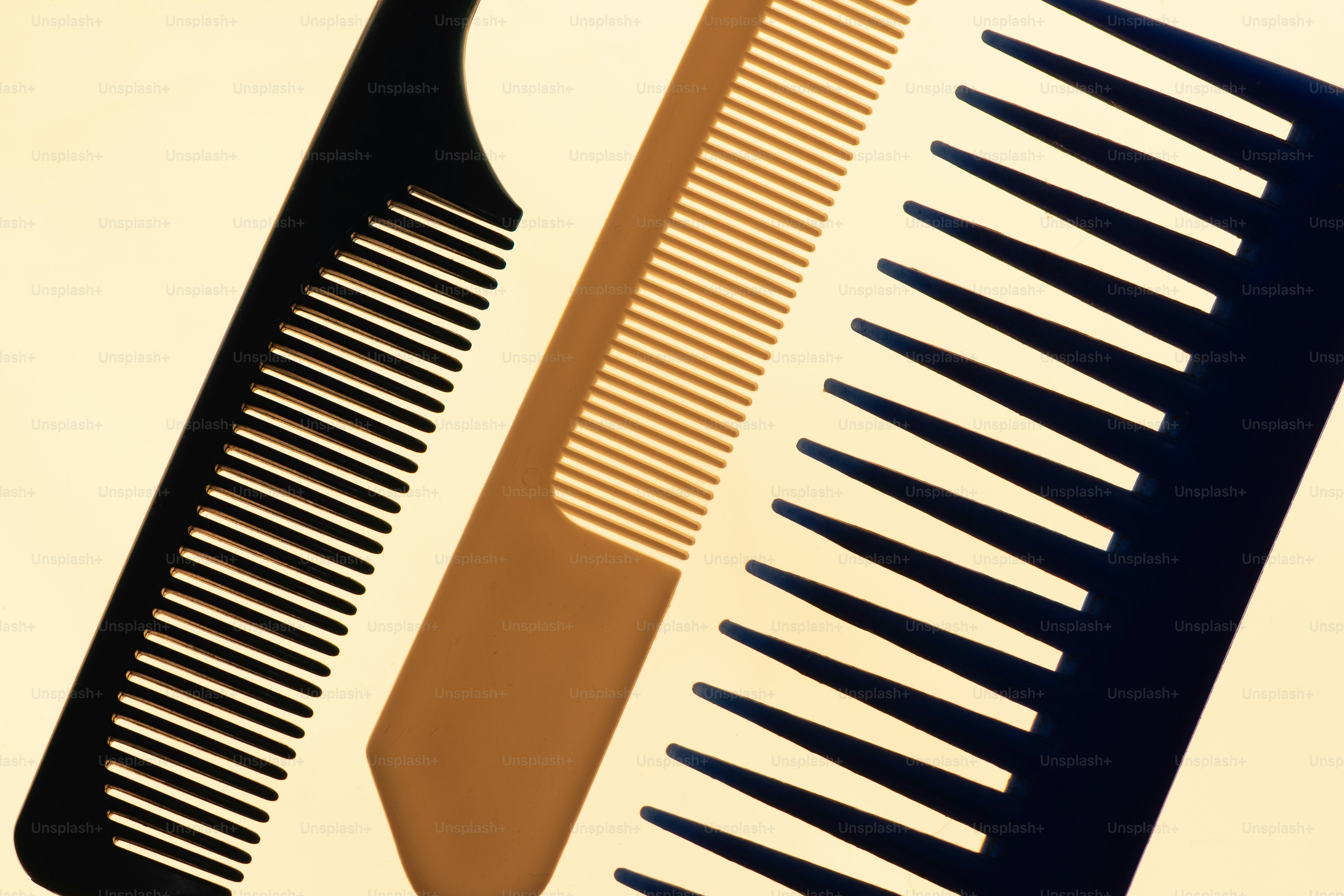 Three combs with different teeth and colors. photo – Pattern Image on ...
