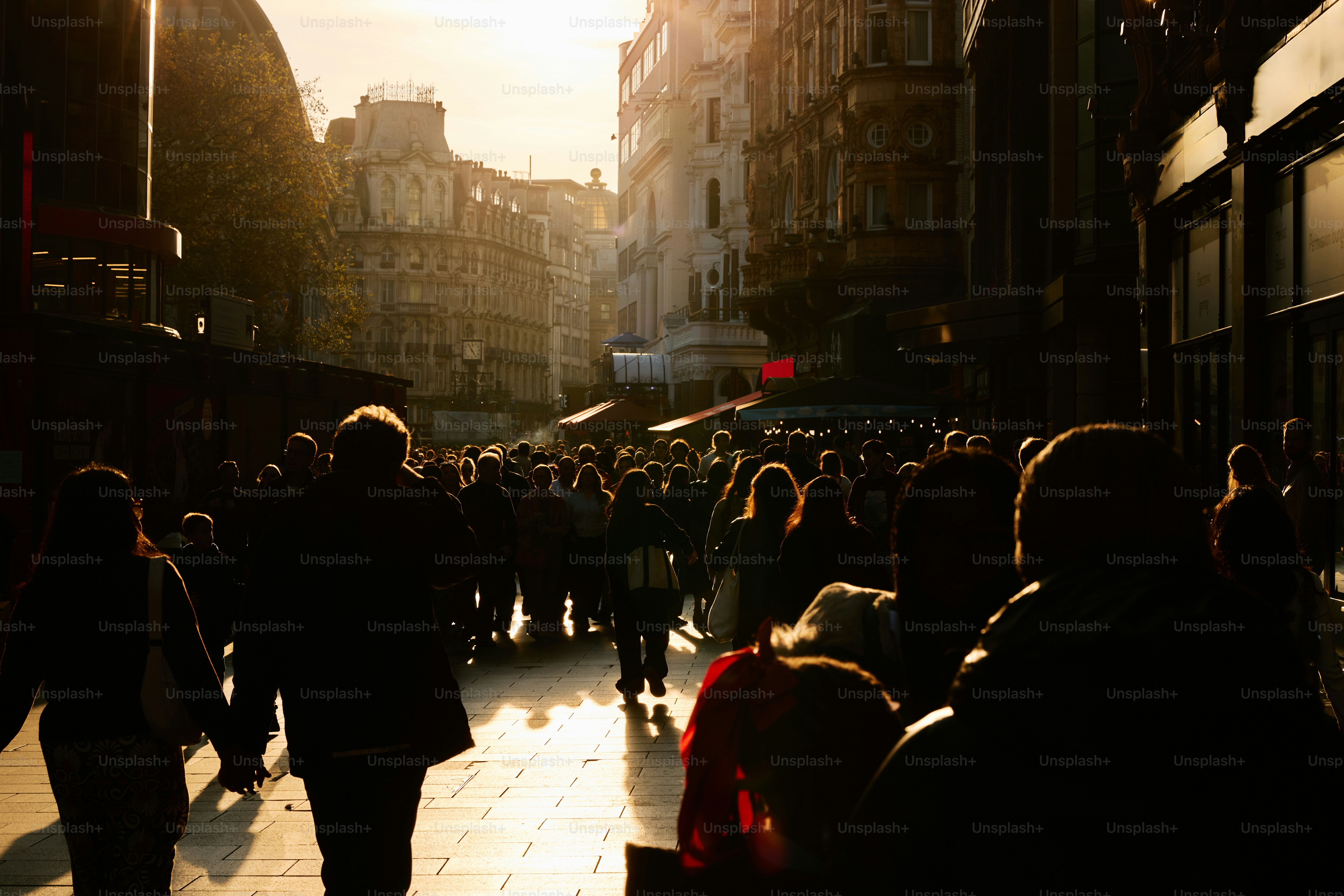 People walking on a street at sunset photo – City Image on Unsplash