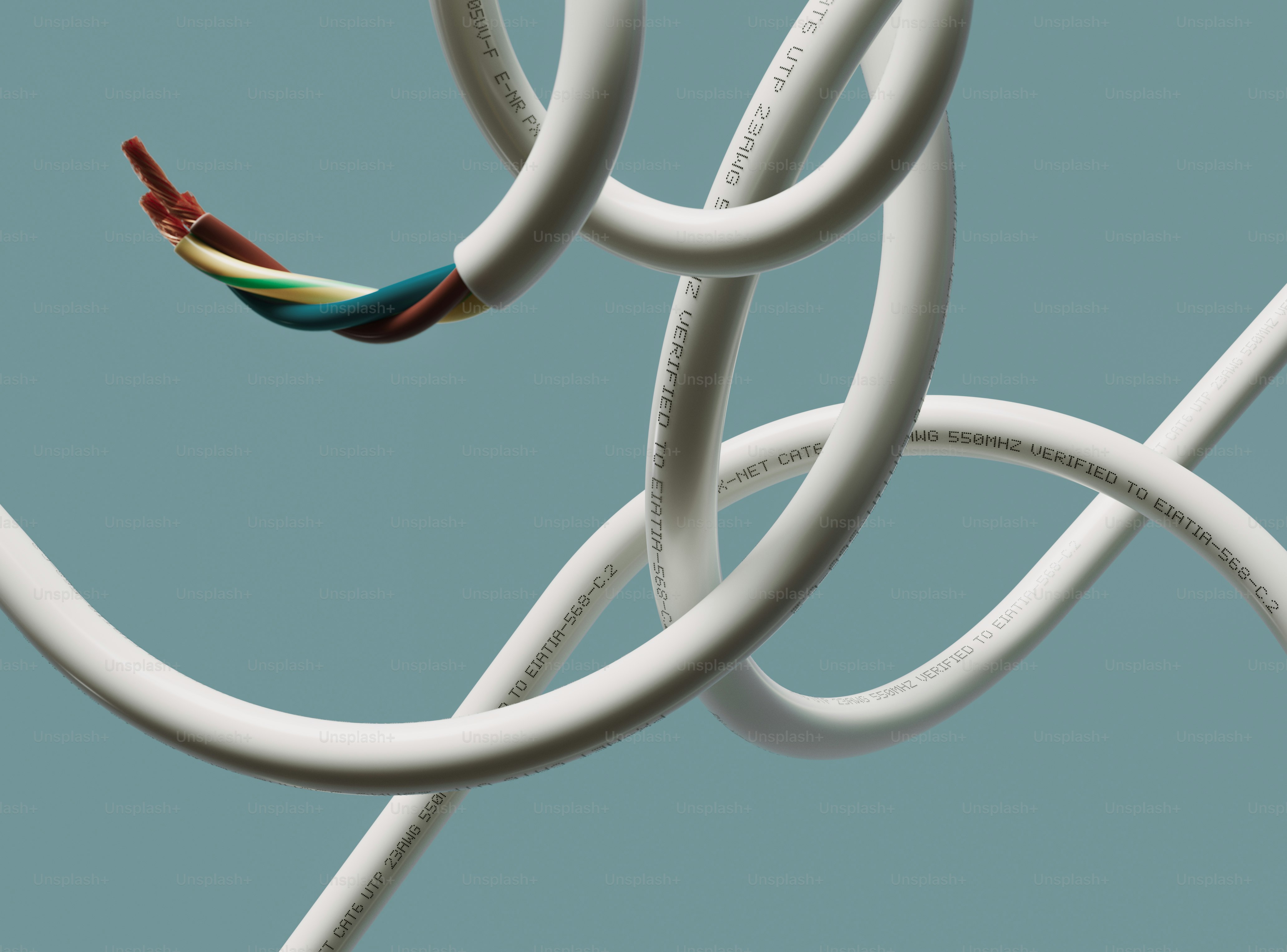 White cables tangled against a blue background