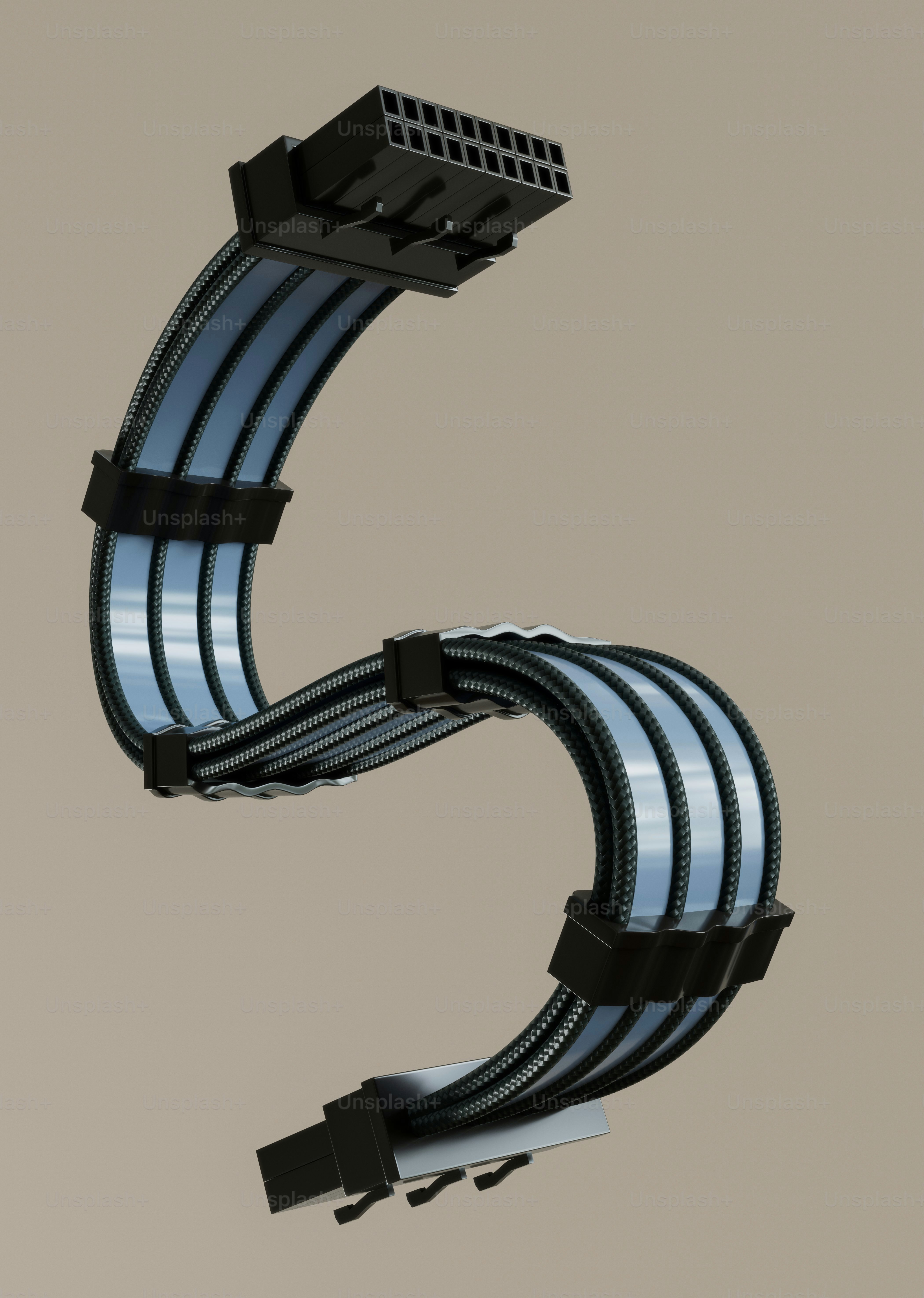 A flexible computer power supply cable with connectors photo ...