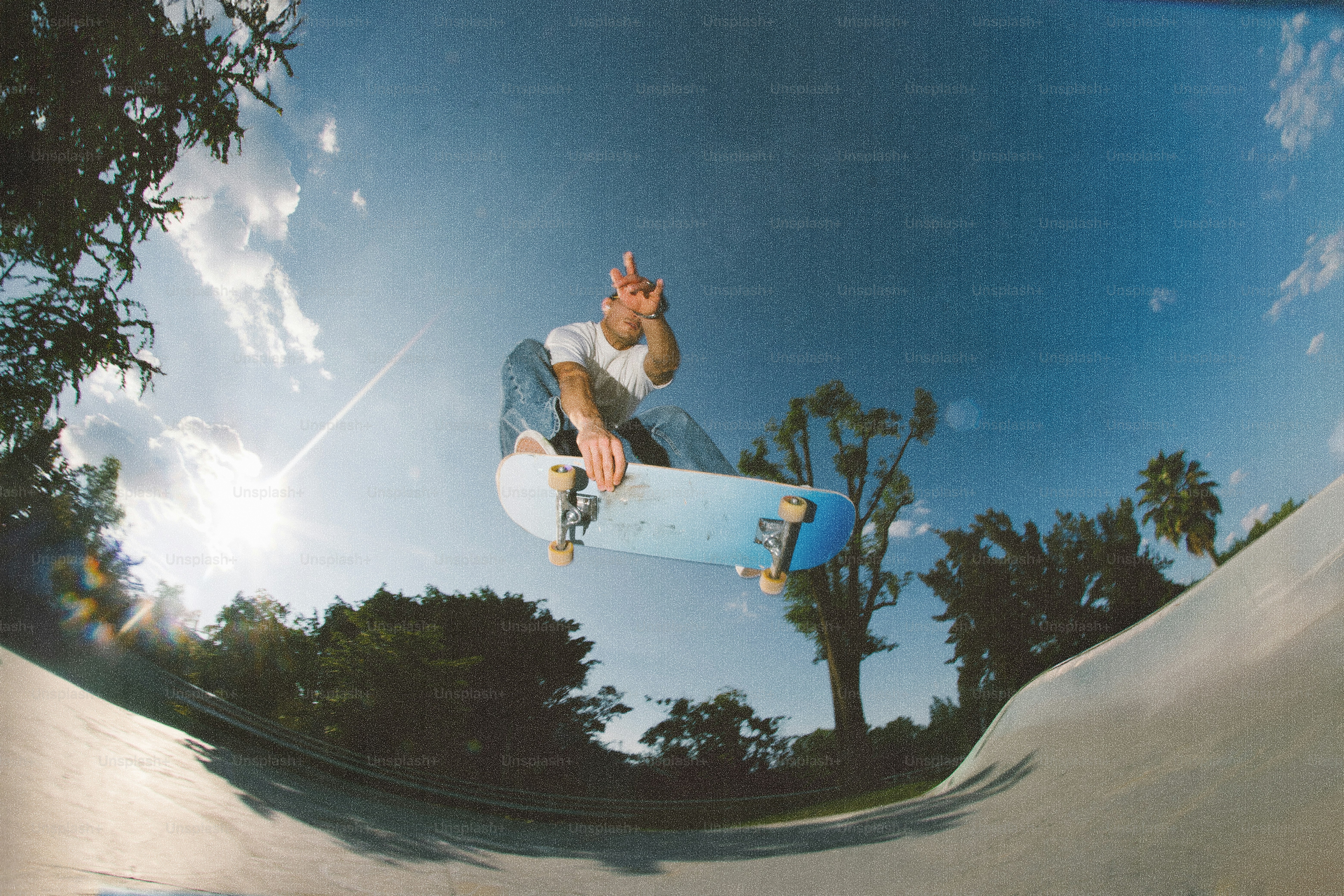 Skateboarder performs a trick in a skatepark