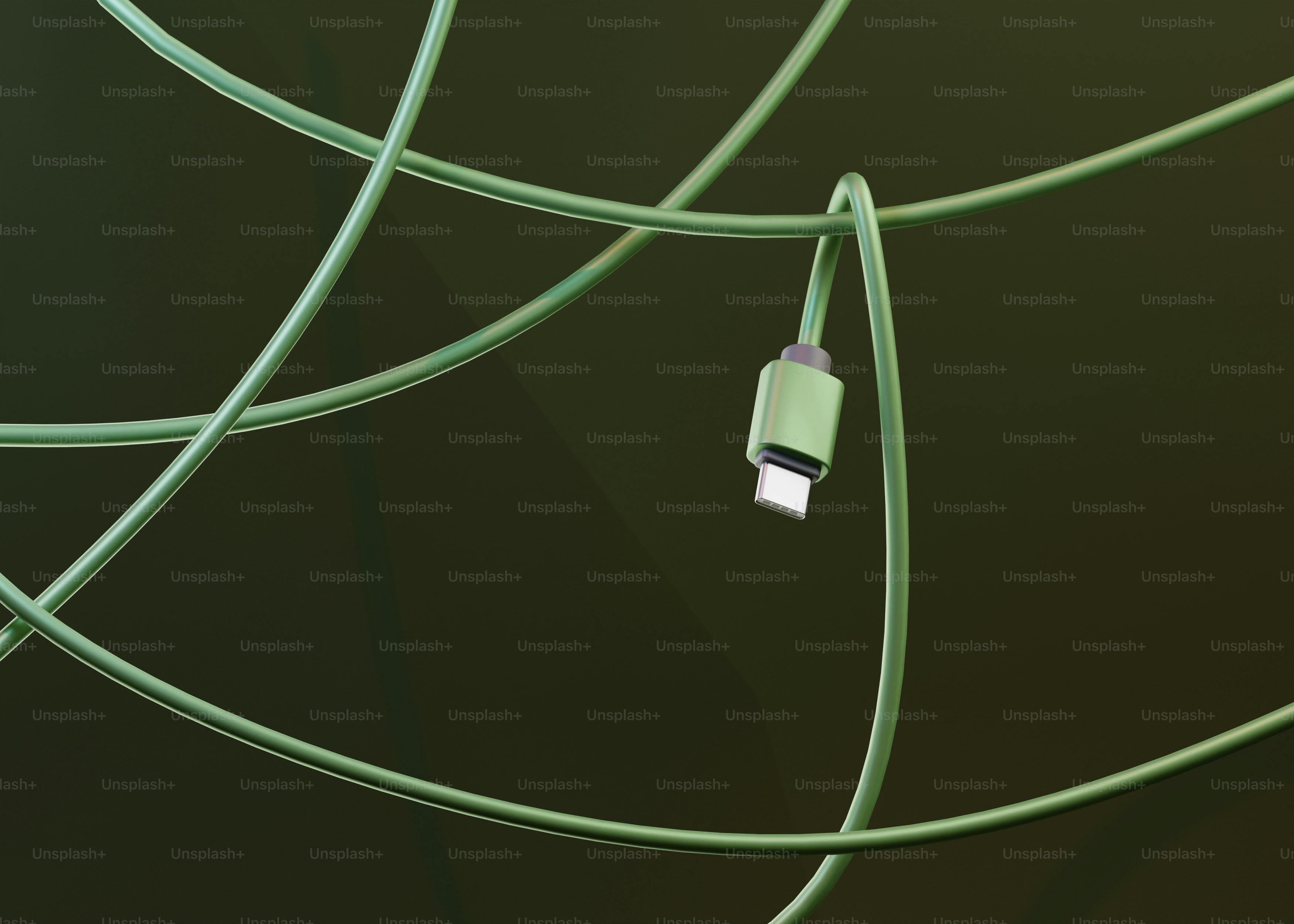 Green usb-c cable tangled against dark background