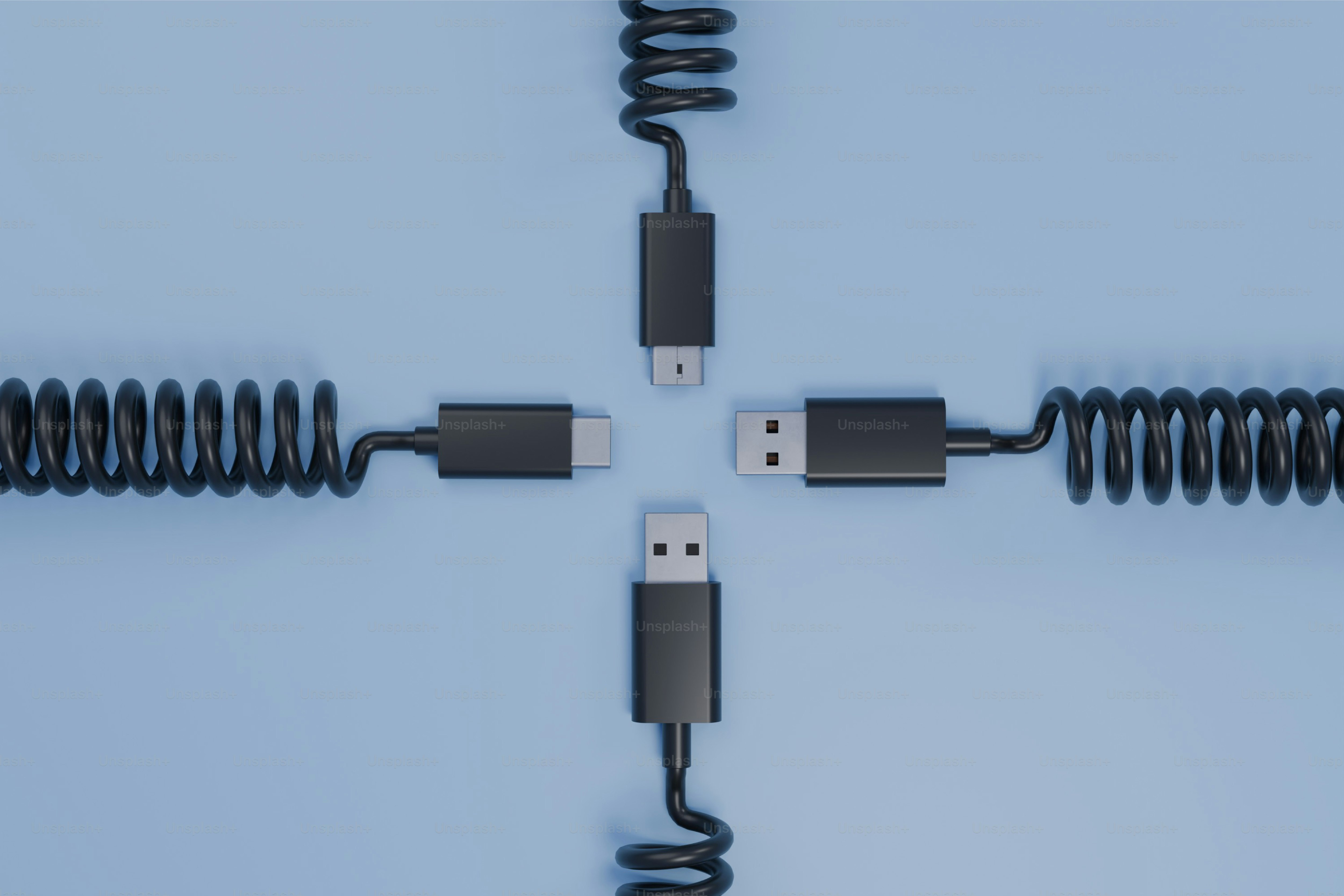 Four usb-c and usb-a cables arranged in a cross