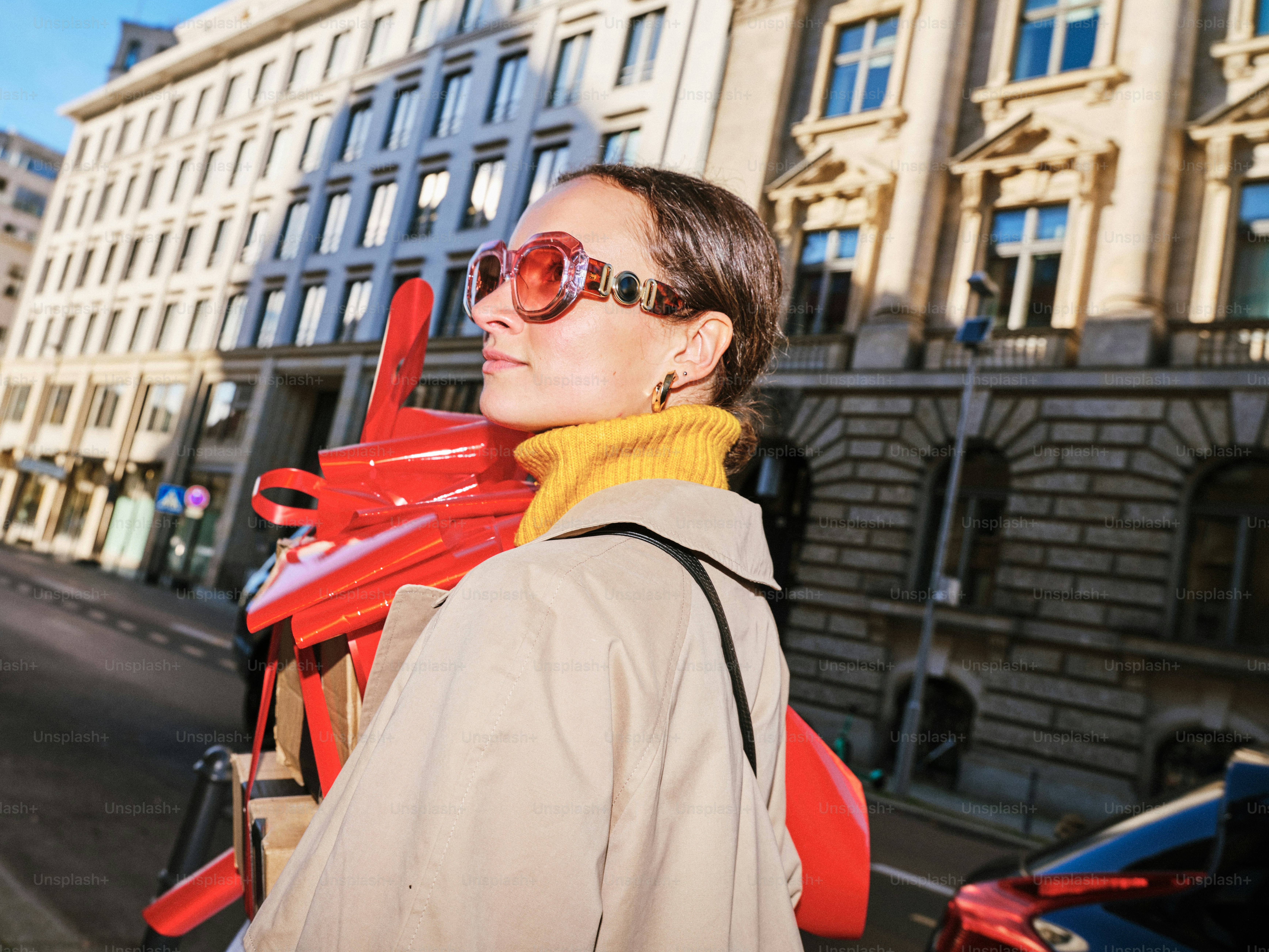 Woman wearing sunglasses in a city street photo – Shopping Image on ...
