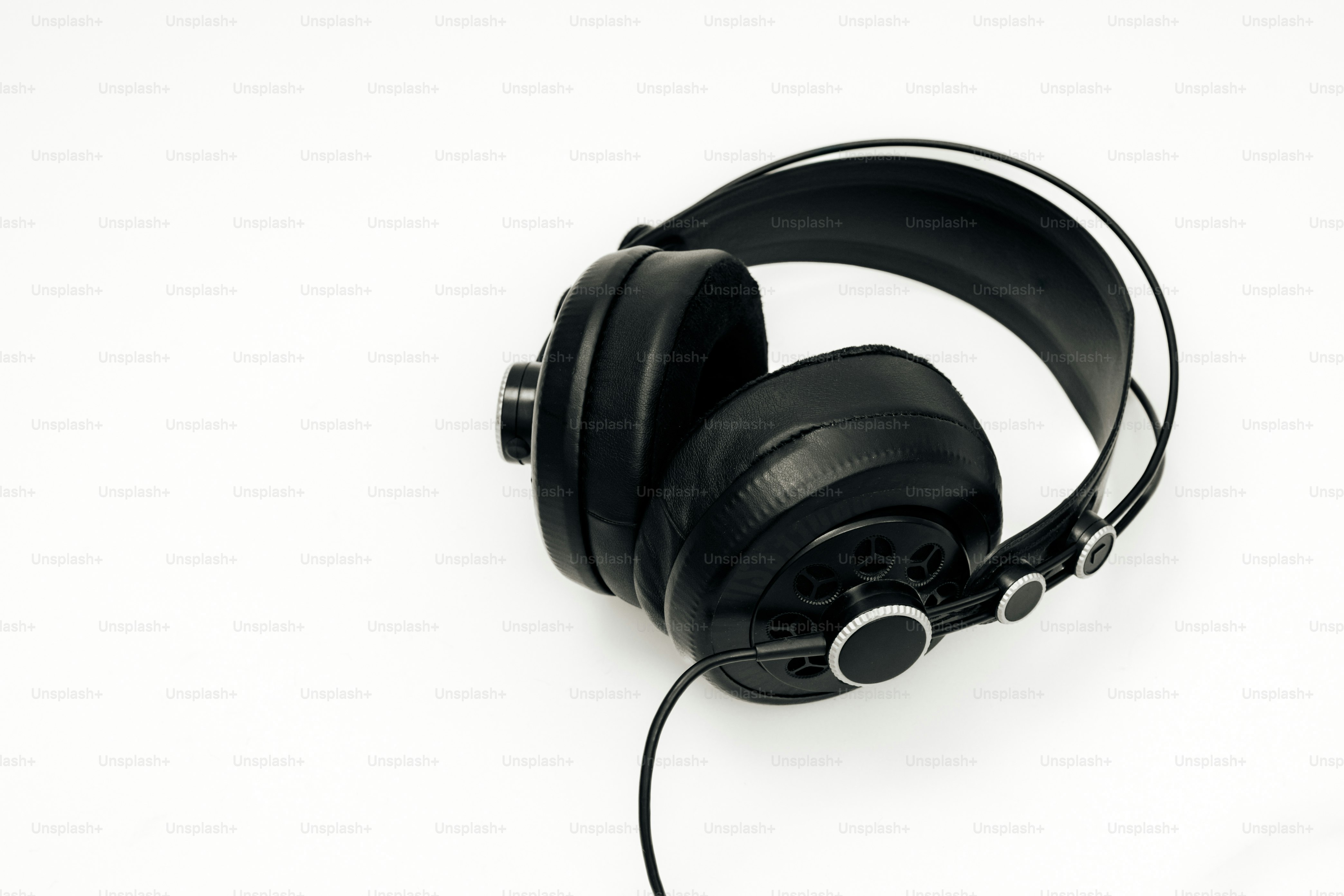 Black headphones on a white background