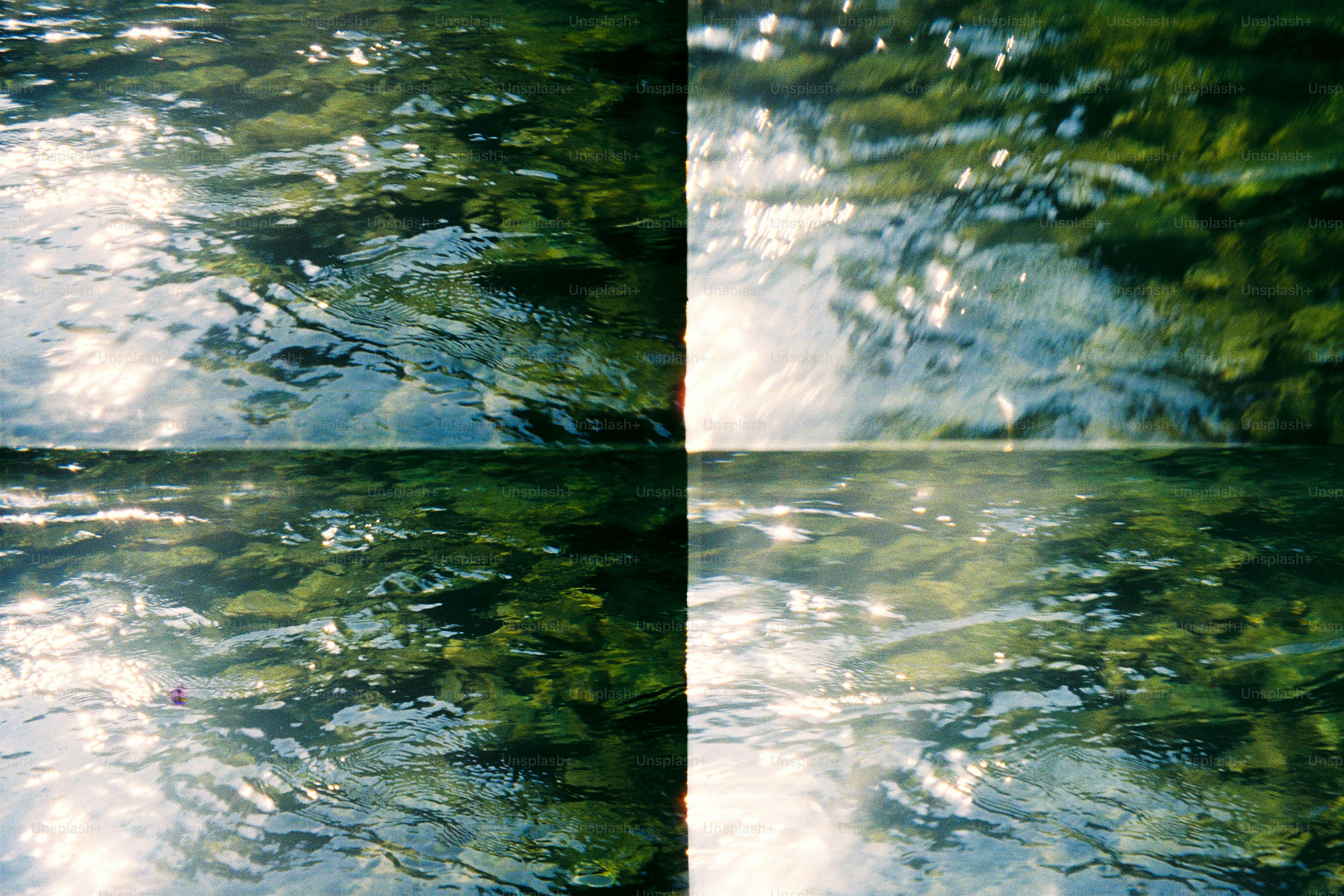 La luz del sol se refleja en el agua que fluye sobre las rocas.