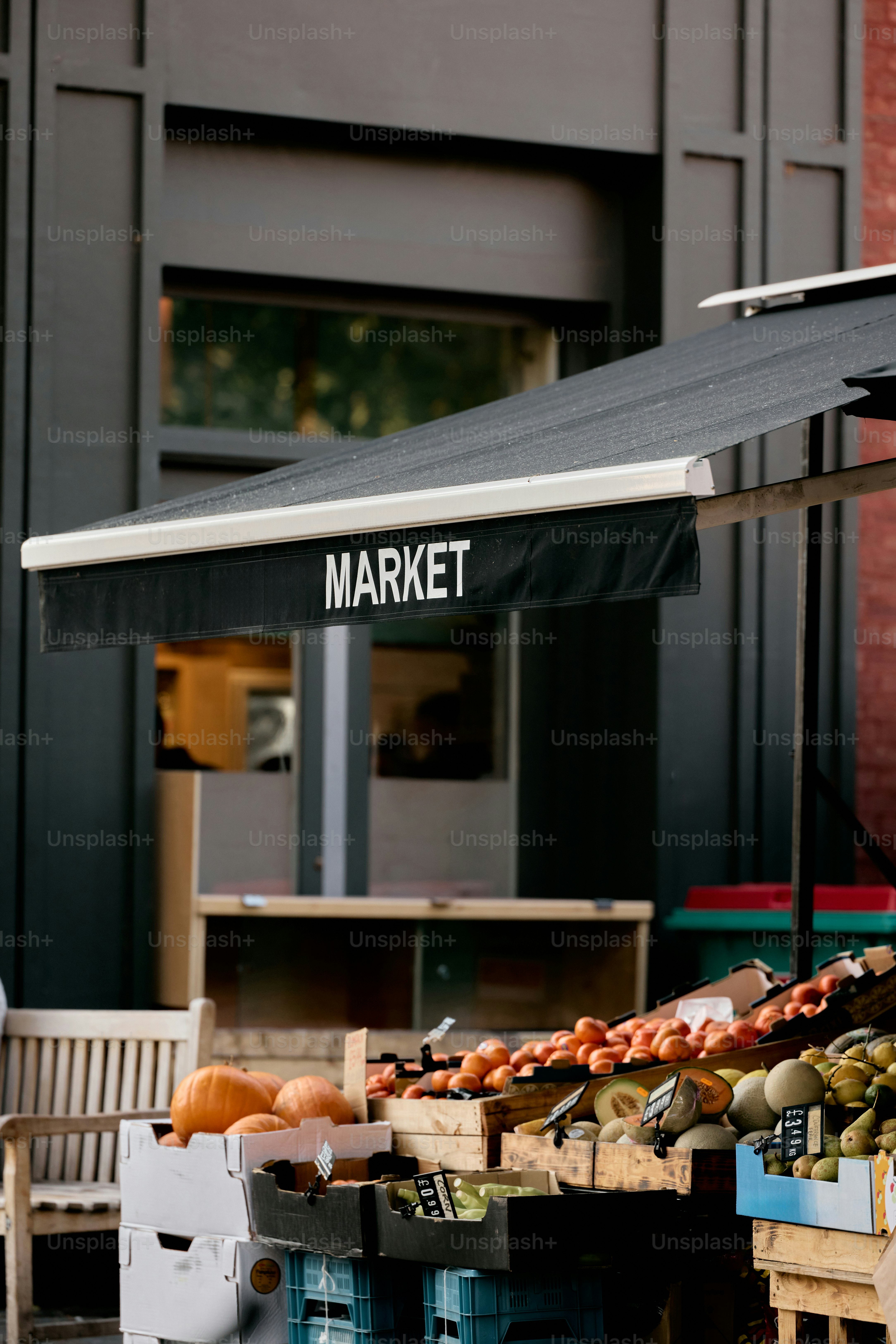 Fresh produce displayed at an outdoor market stall.