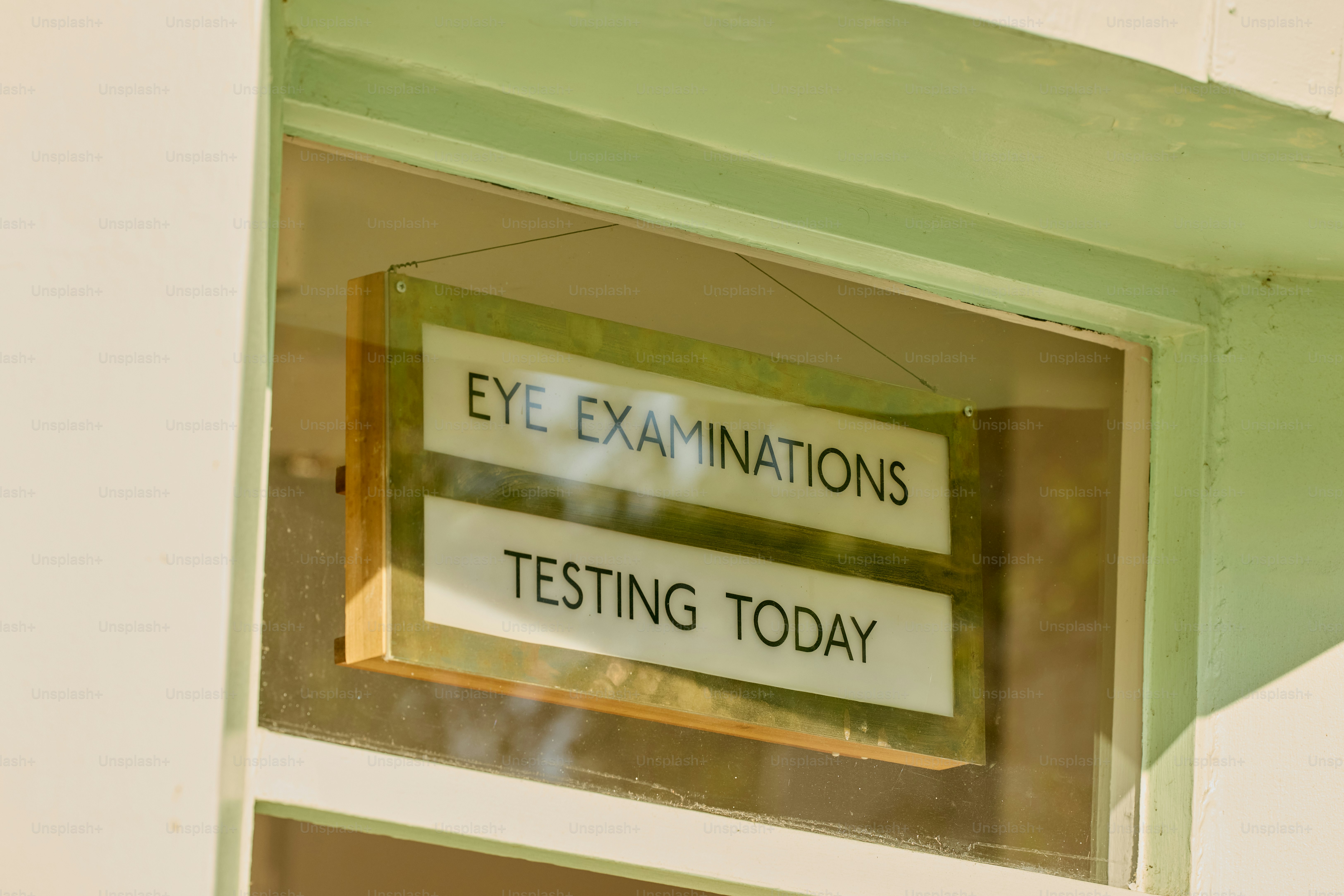 Eye examinations testing today sign
