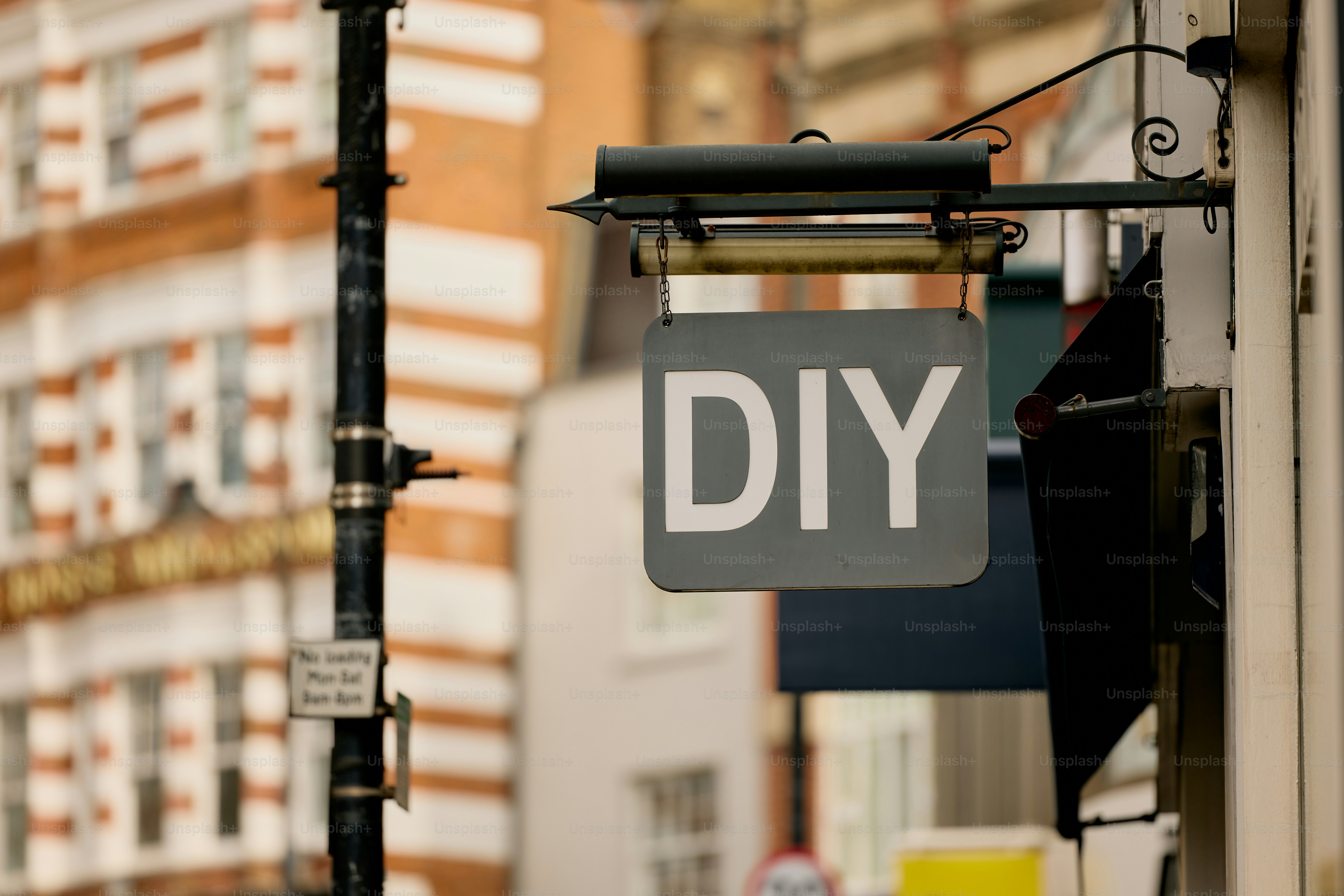Diy store sign hanging outside building