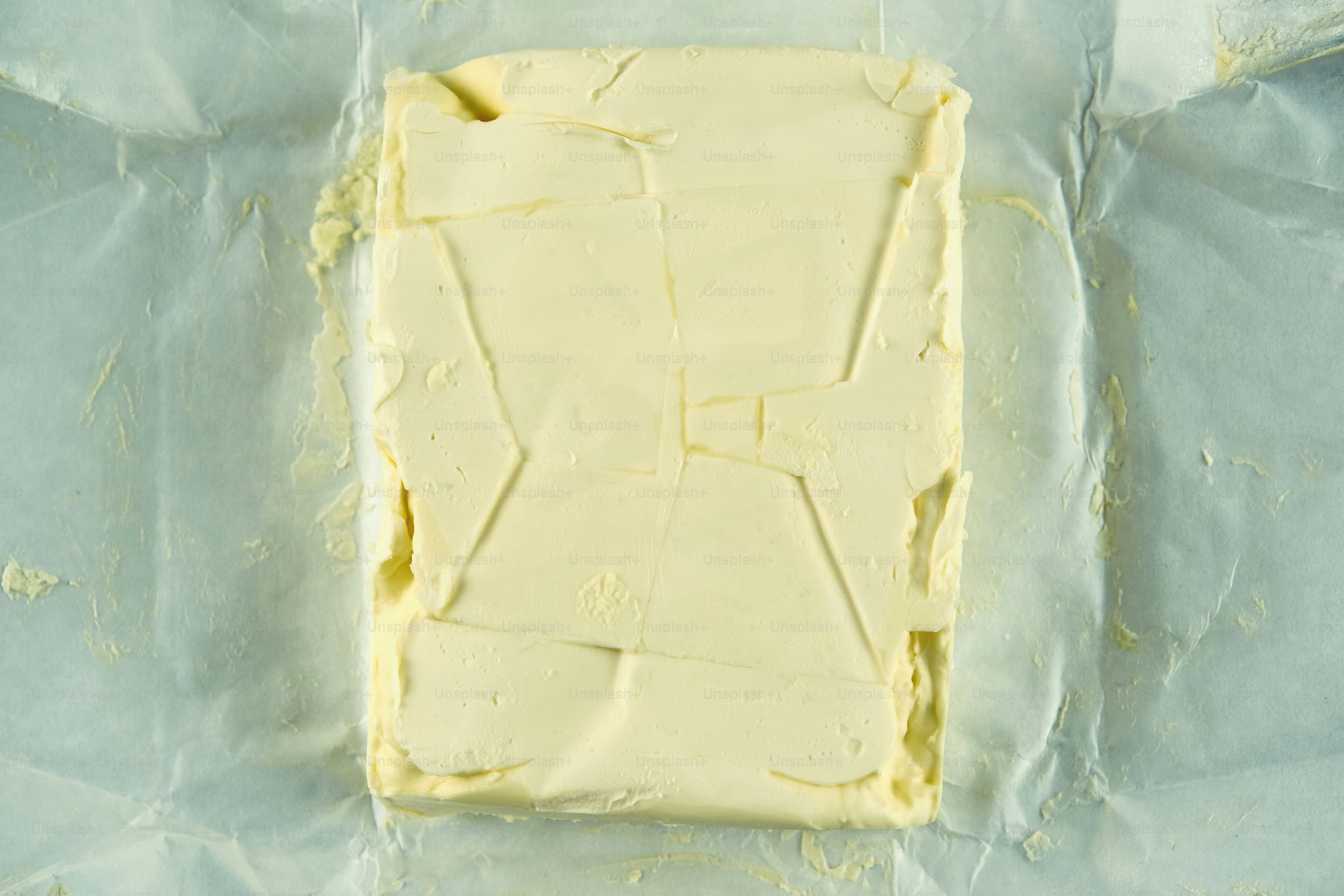 A Block Of Butter On Parchment Paper Photo Aesthetic Image On Unsplash