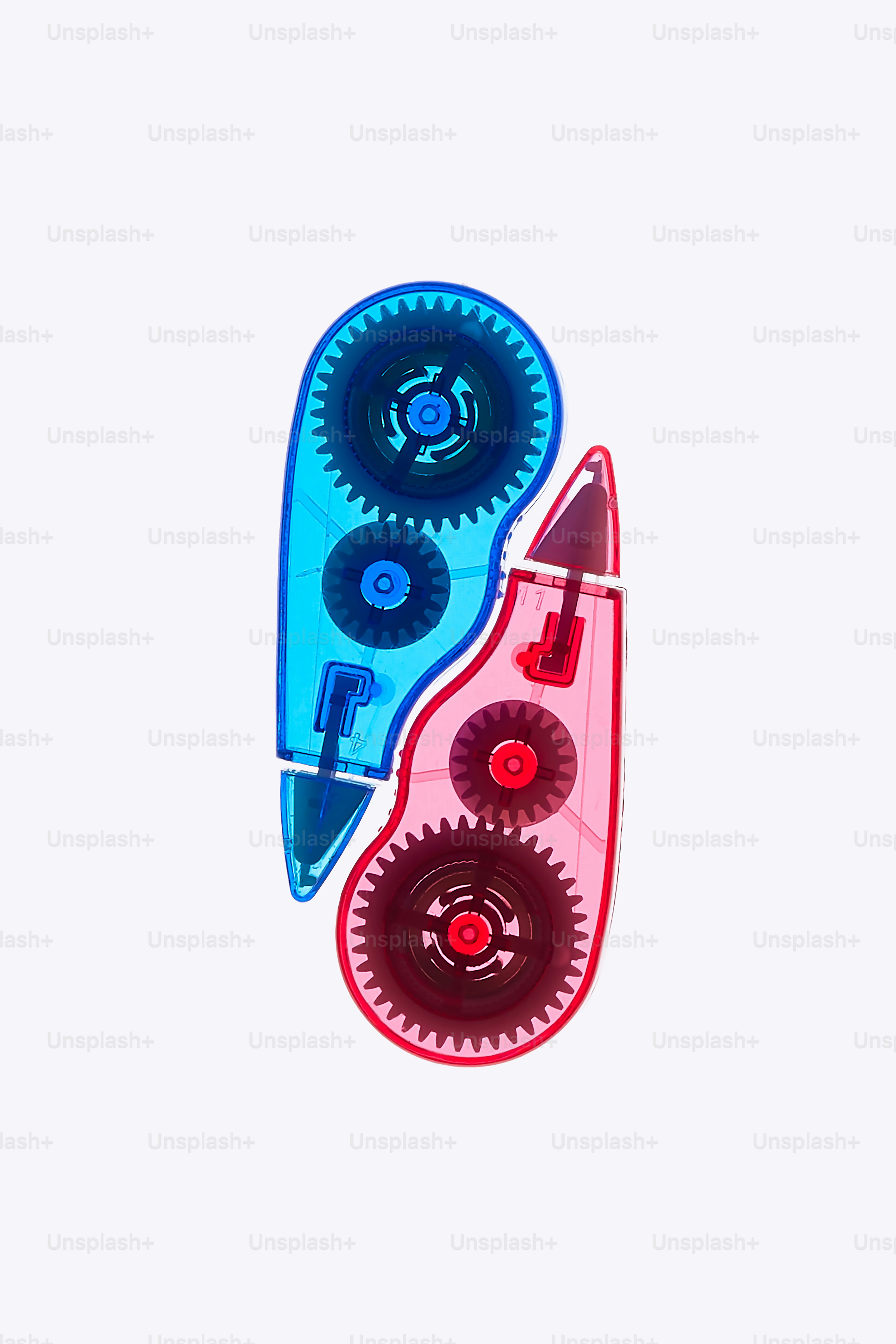 Two correction tape dispensers with gears