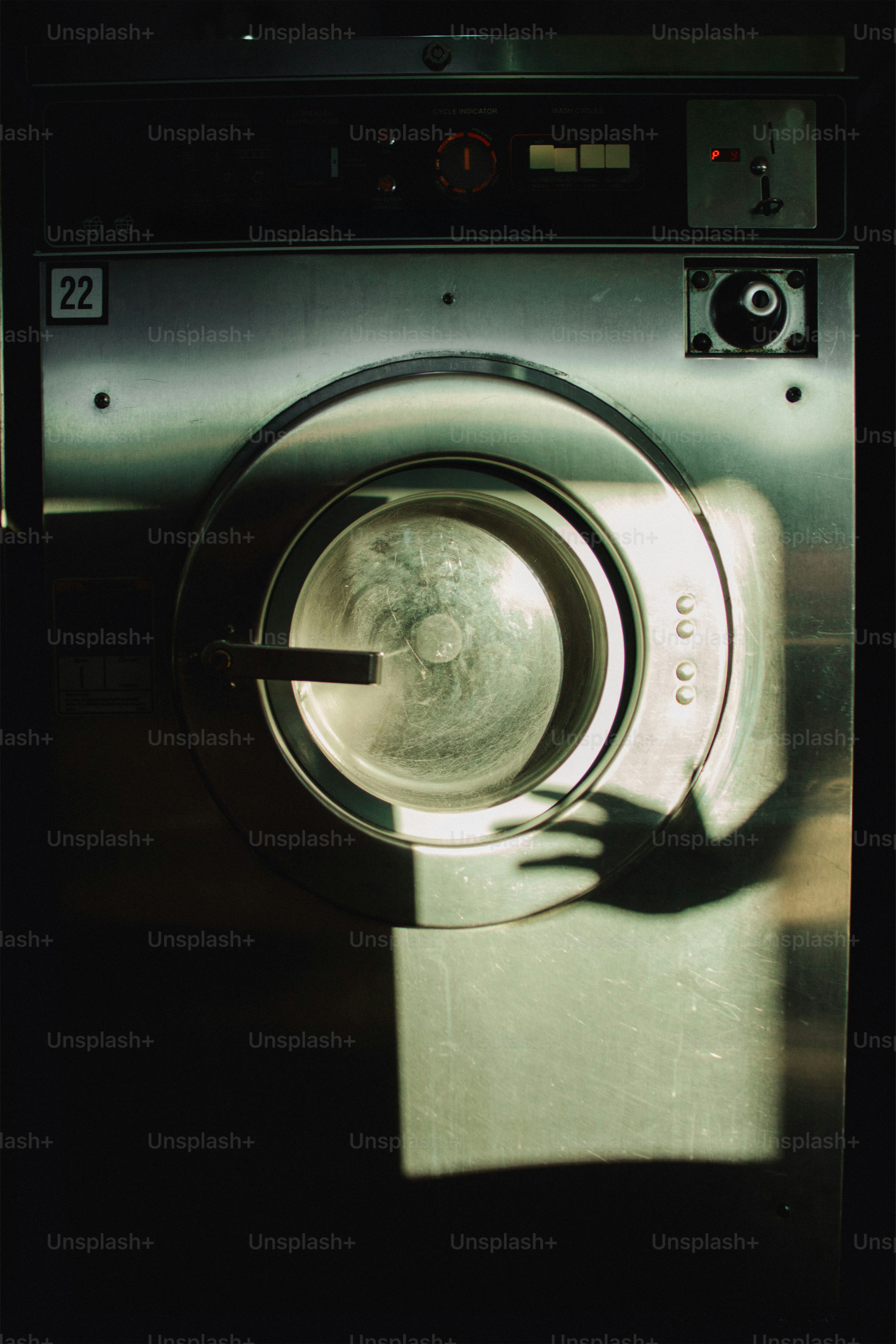 Washing machine with a hand shadow on door. photo – Vintage Image on ...