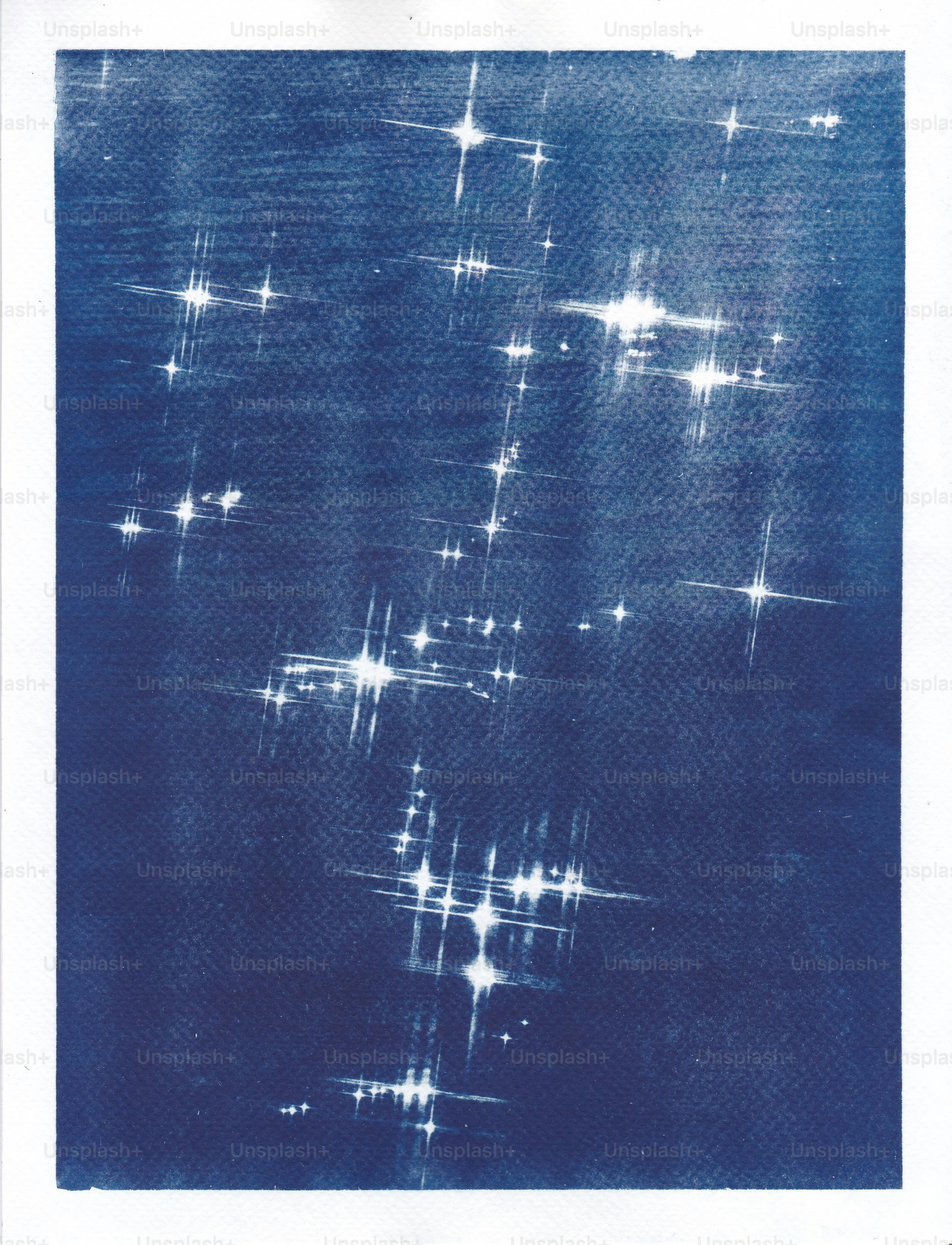 Sparkling light reflections on dark blue water