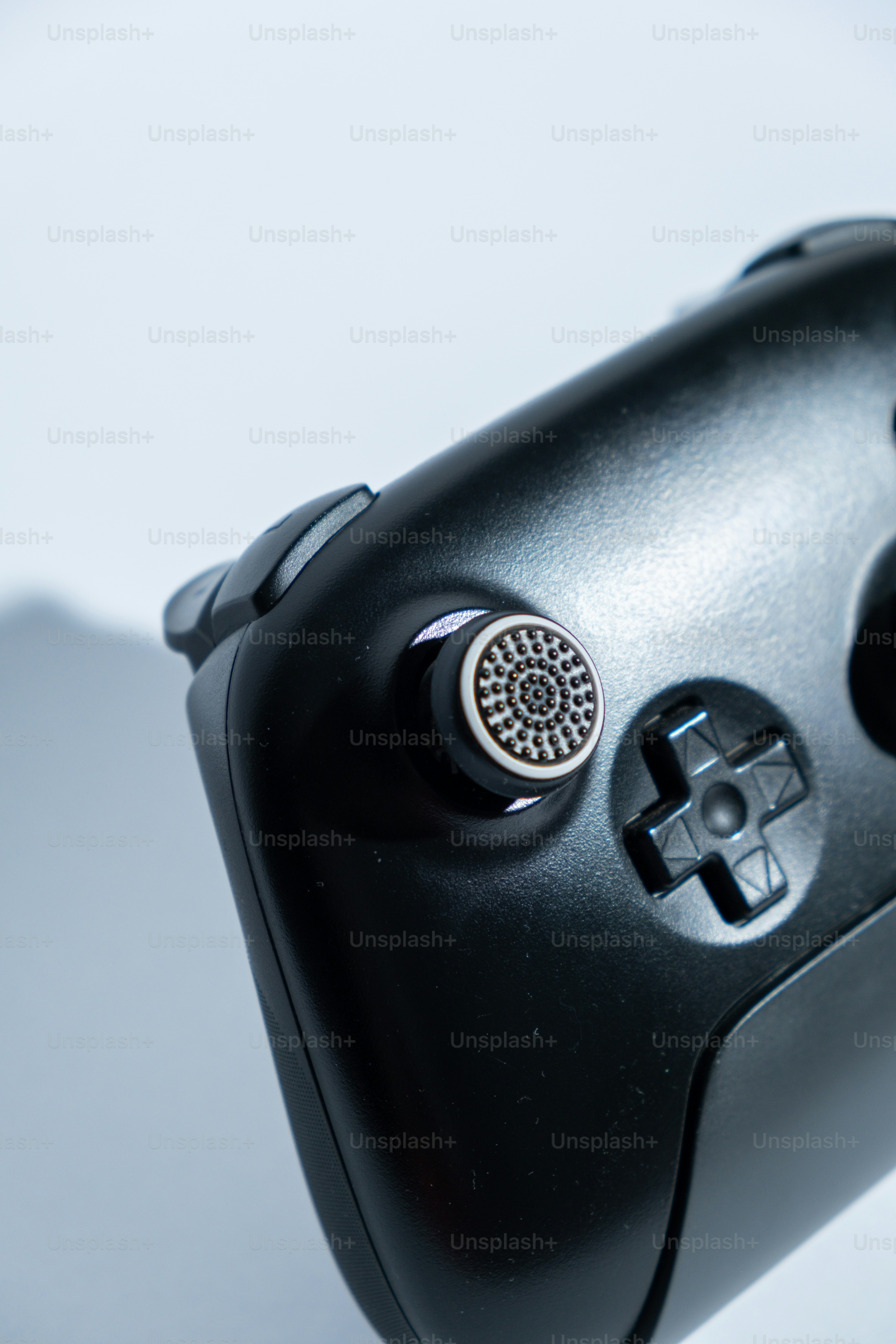 Close up of a black video game controller