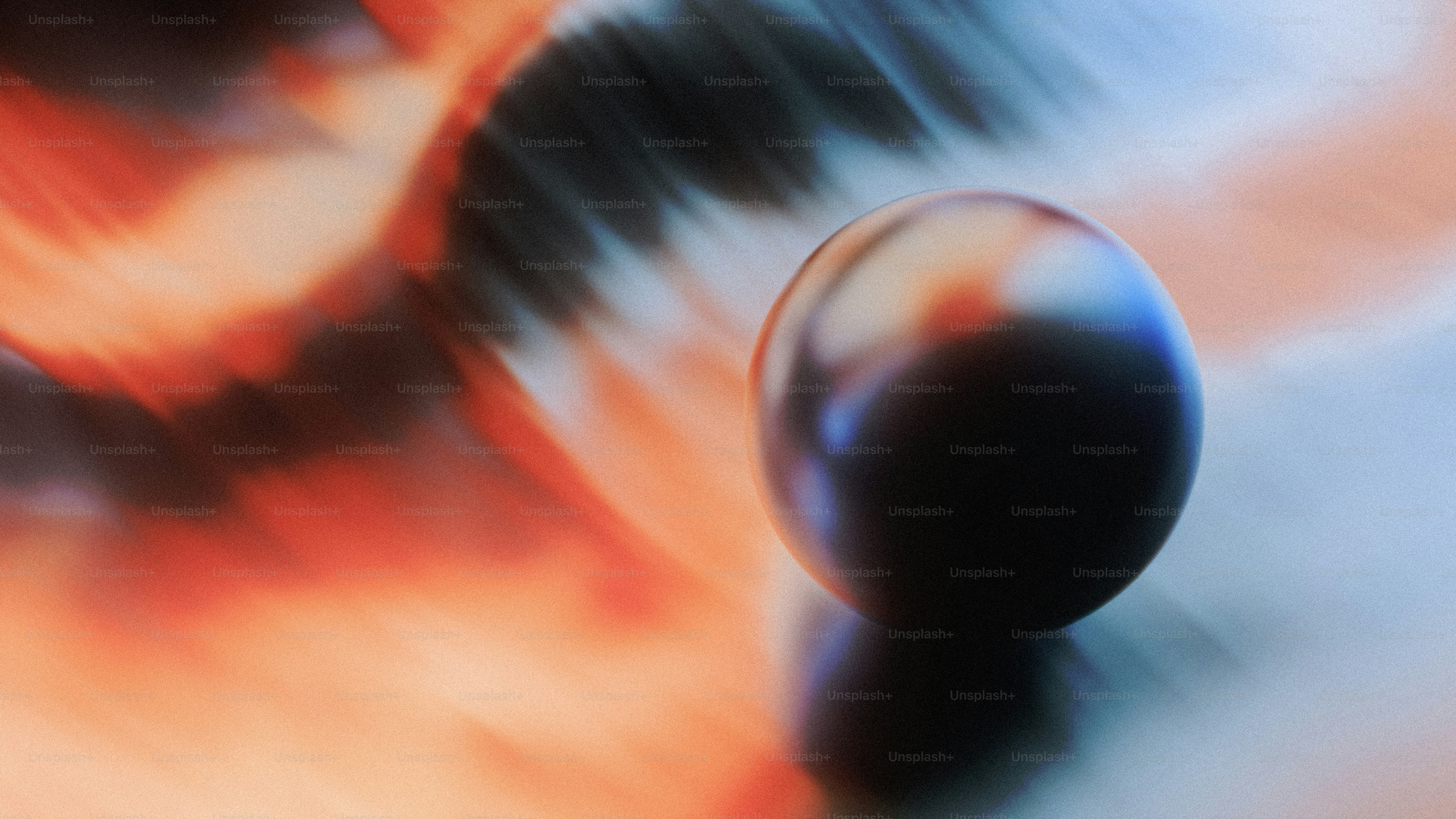 ぼやけたカラフルな背景を持つ暗い球体