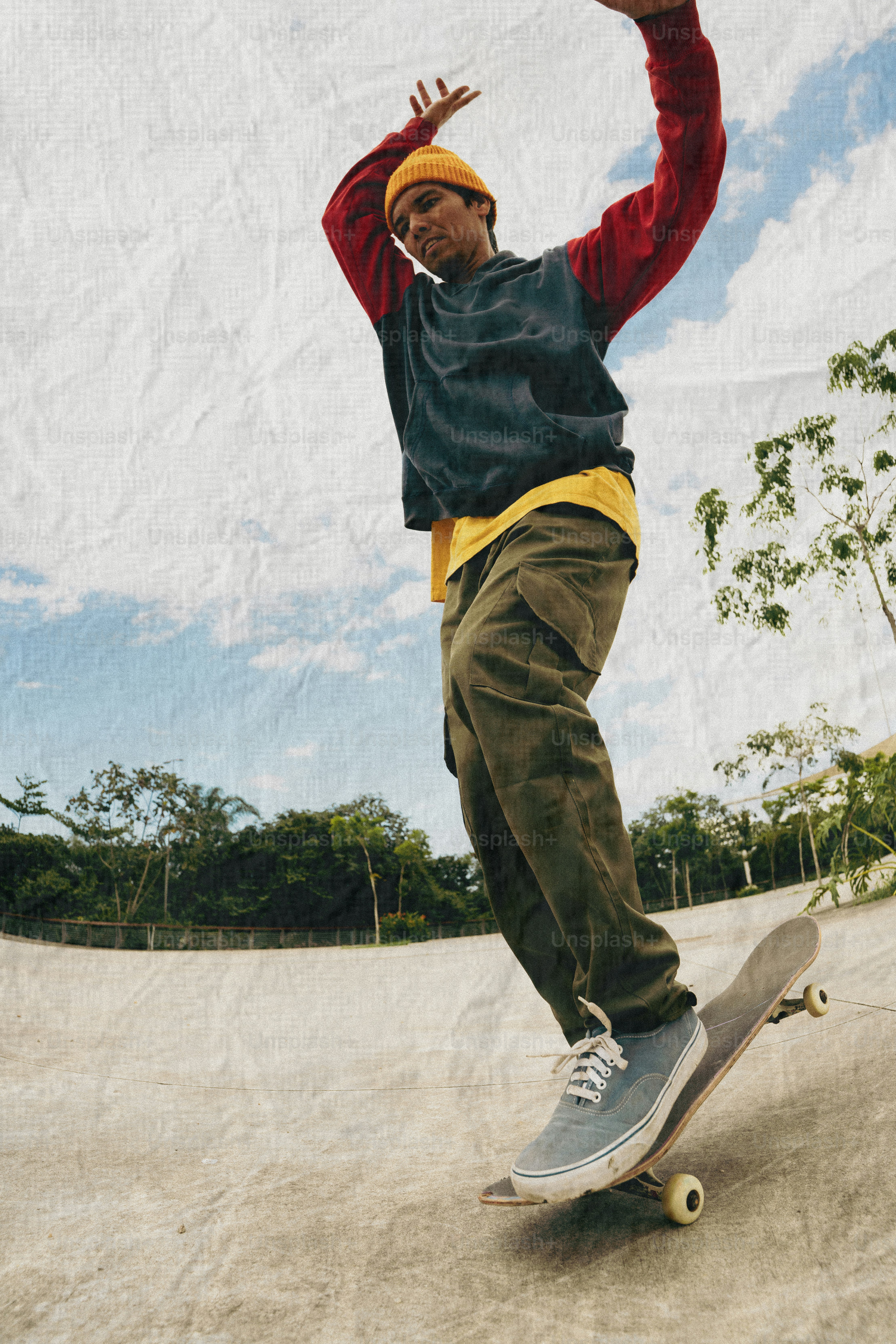 Young man skateboarding in a skatepark