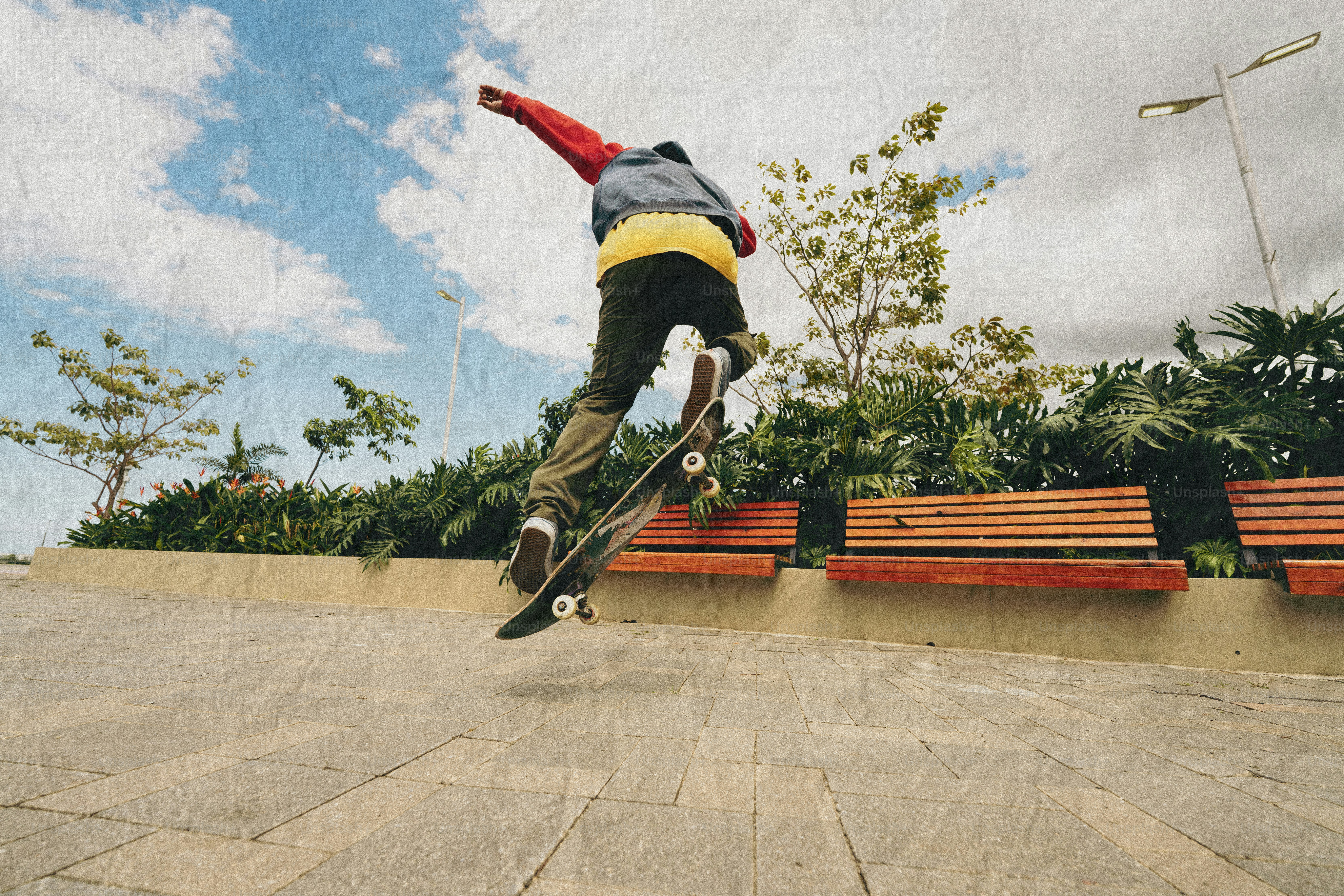 Skateboarder performing a trick in mid-air