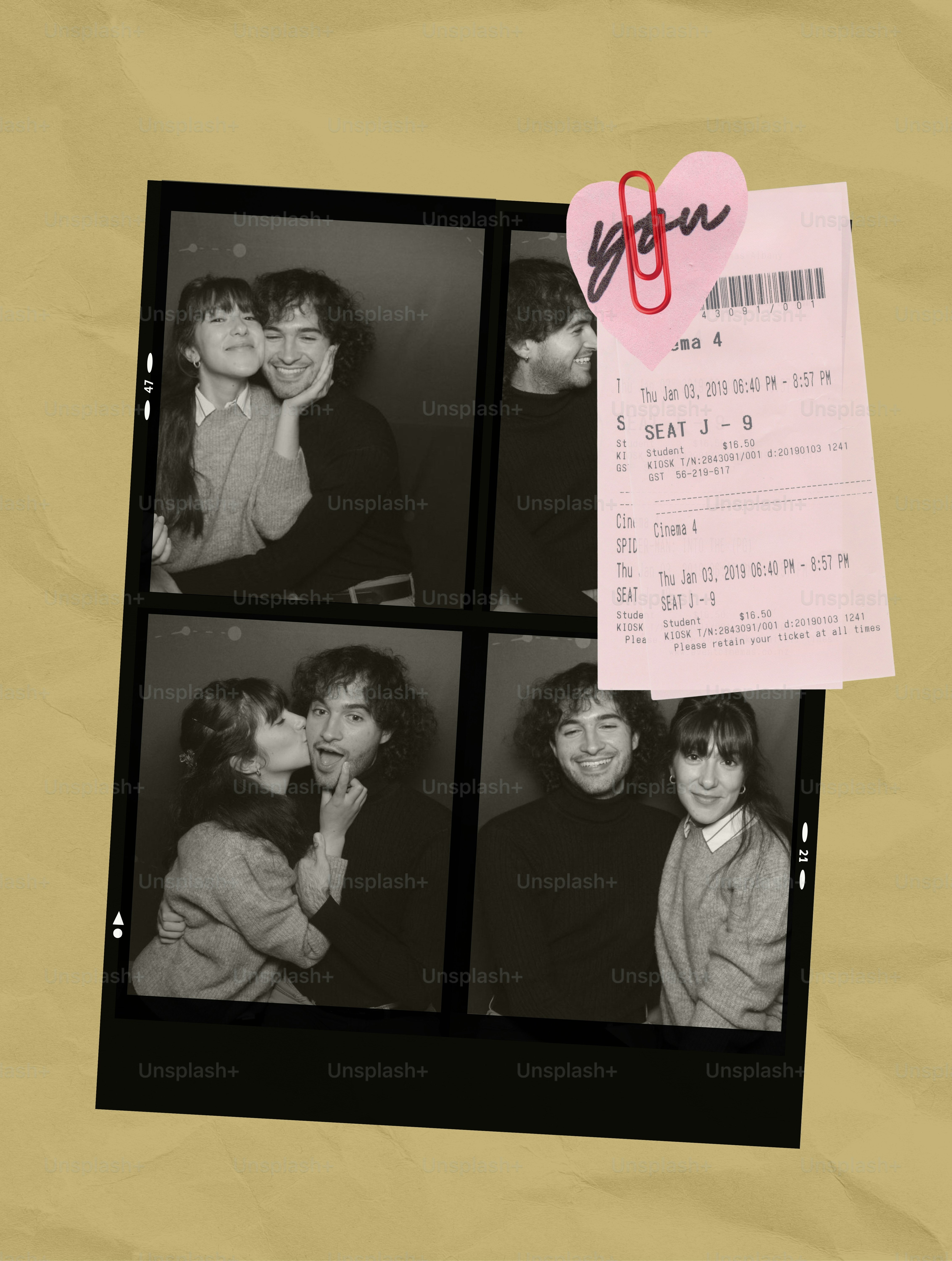 Couple posing in a photo booth with ticket