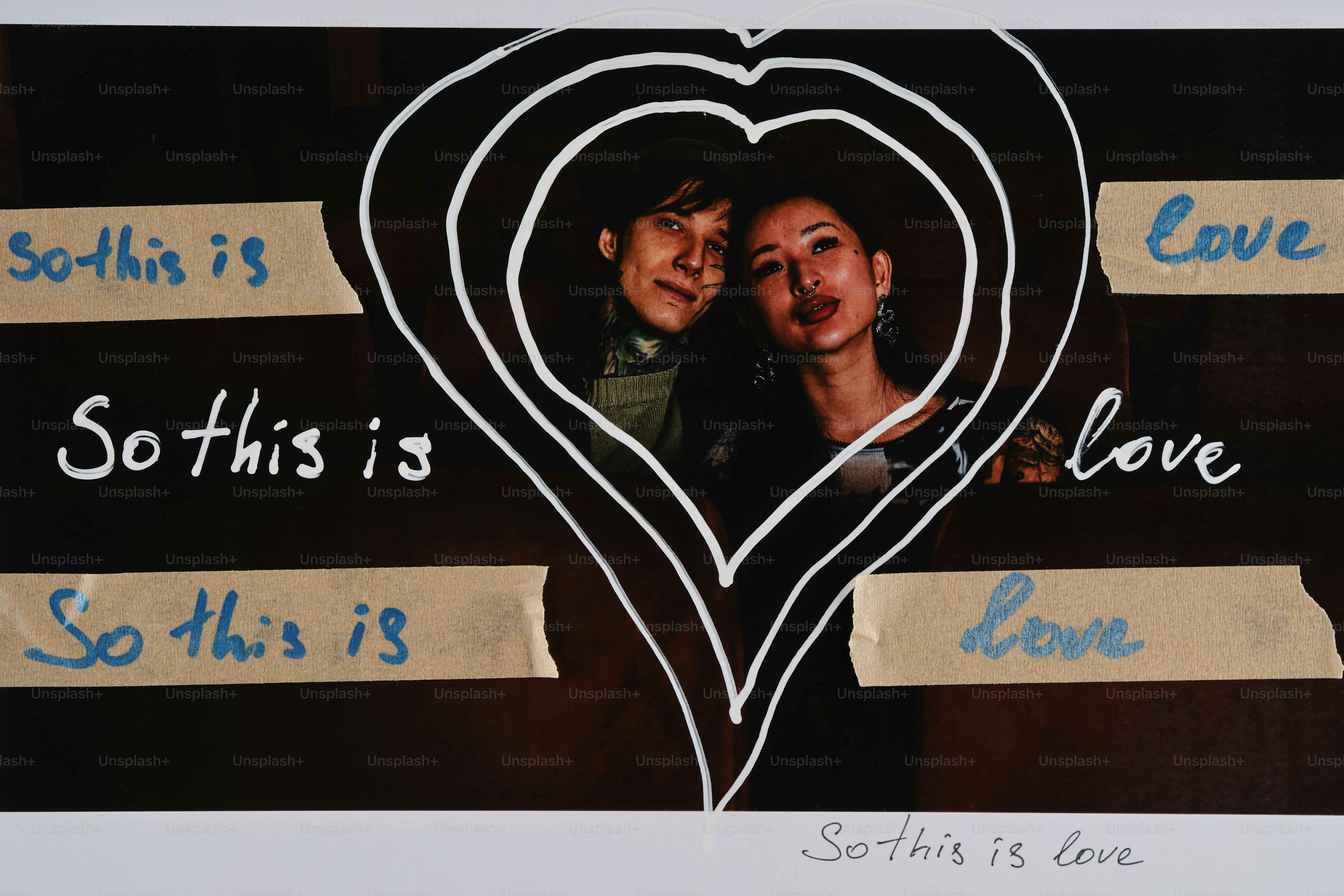 Couple framed by concentric hearts with text