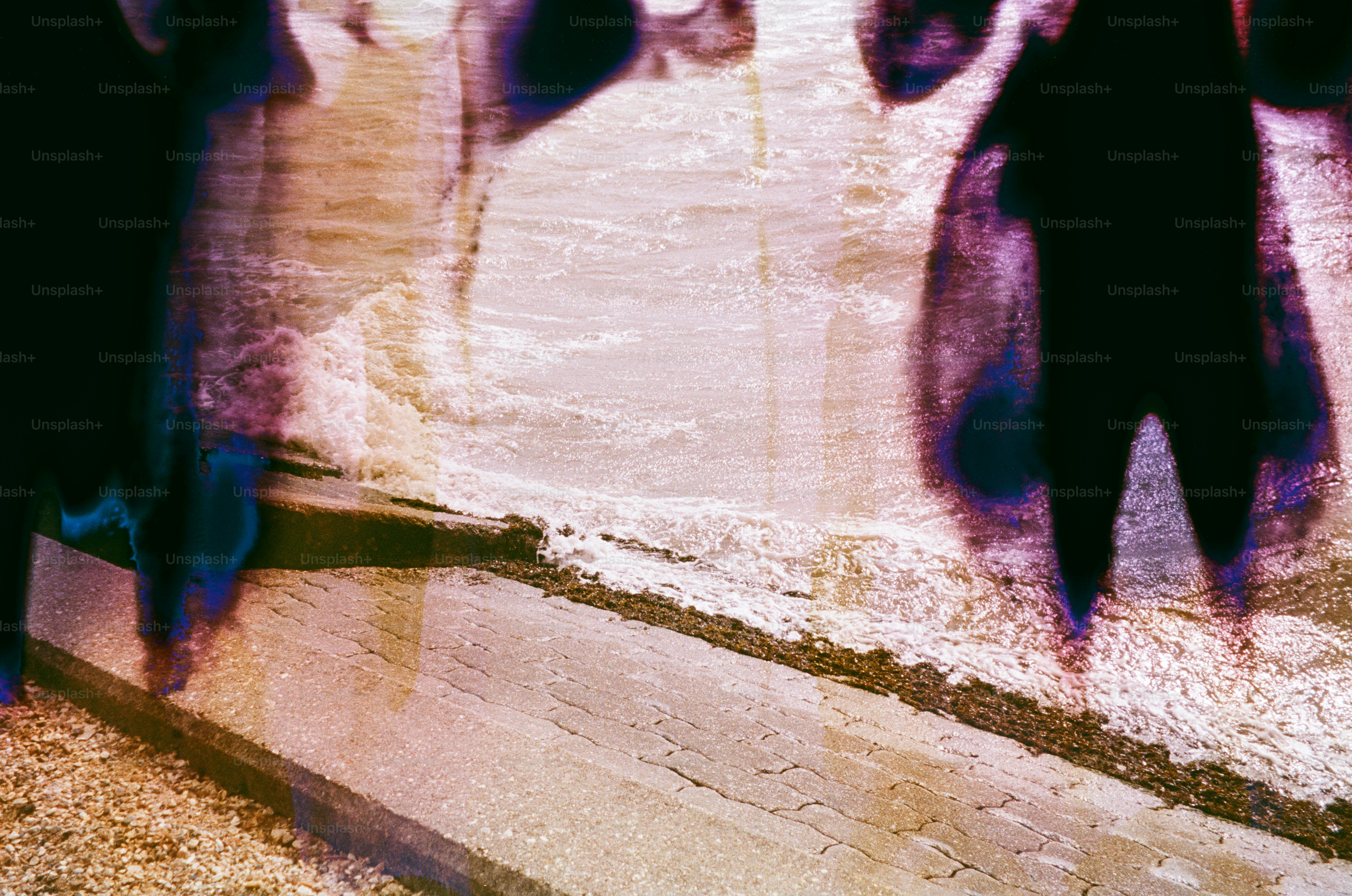 Abstract blurry figures with purple and blue hues