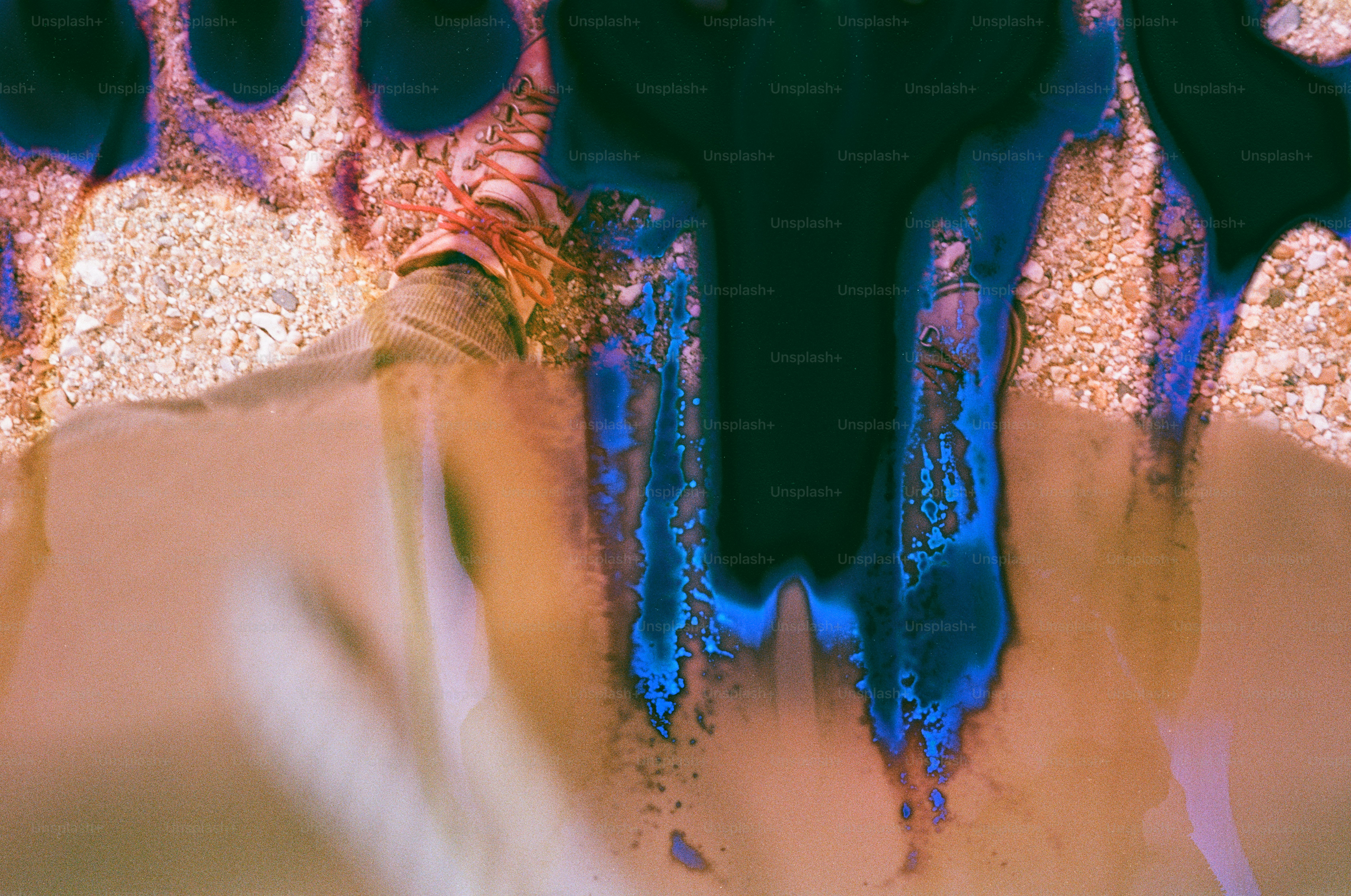 Abstract colorful texture with dark blue and orange hues