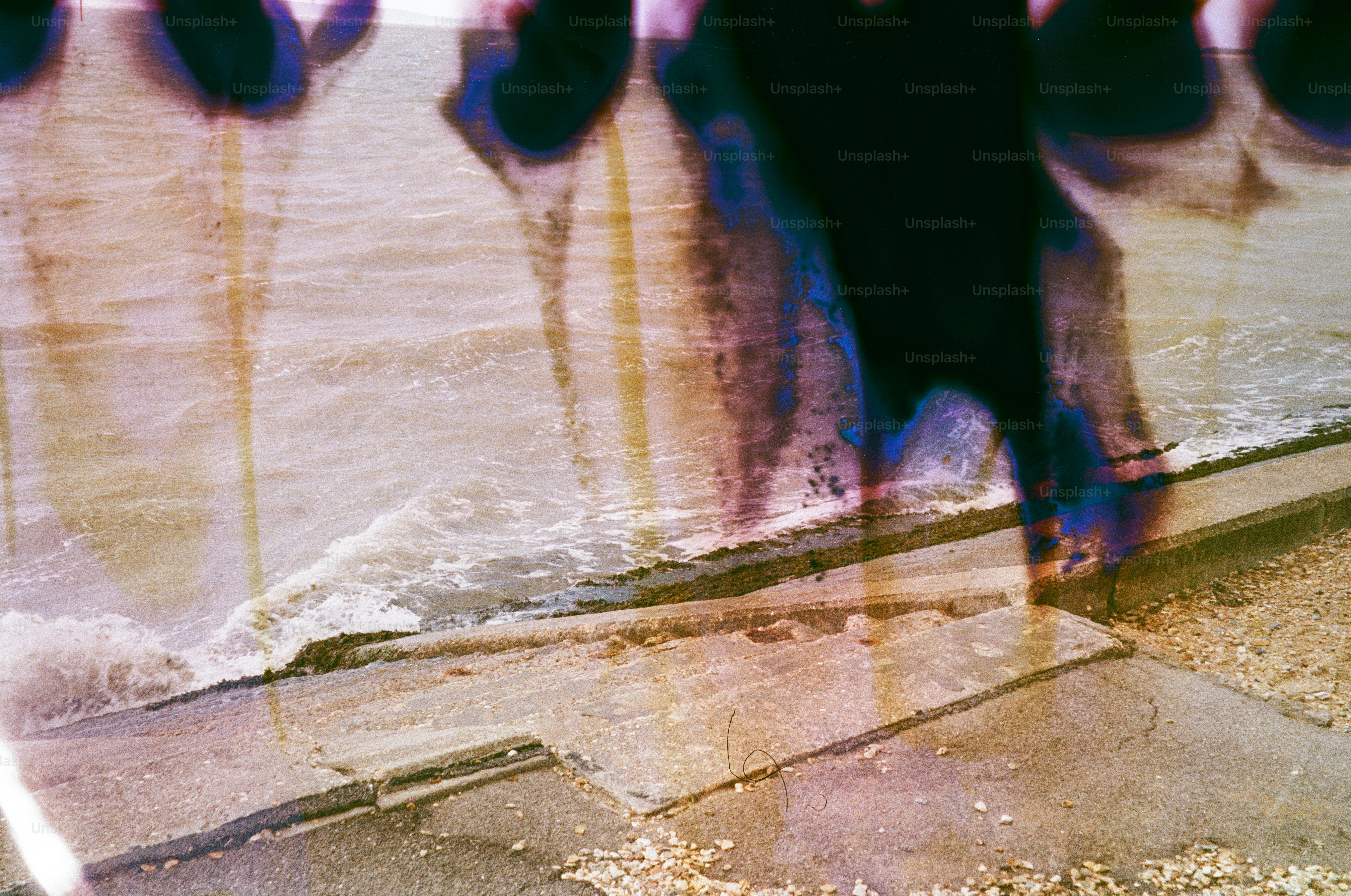 Abstract reflection of people on a wet surface