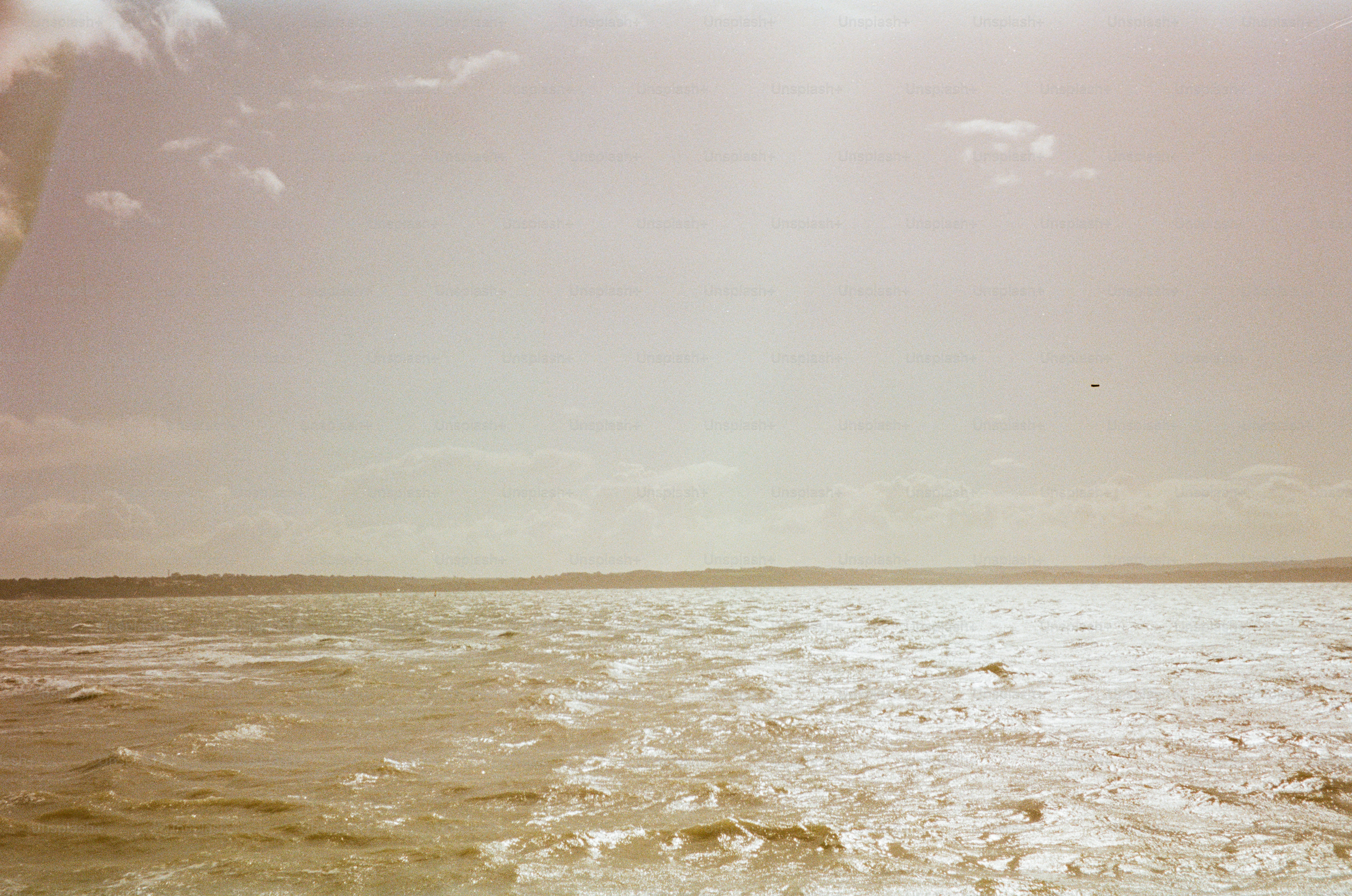 Waves on the sea under a cloudy sky