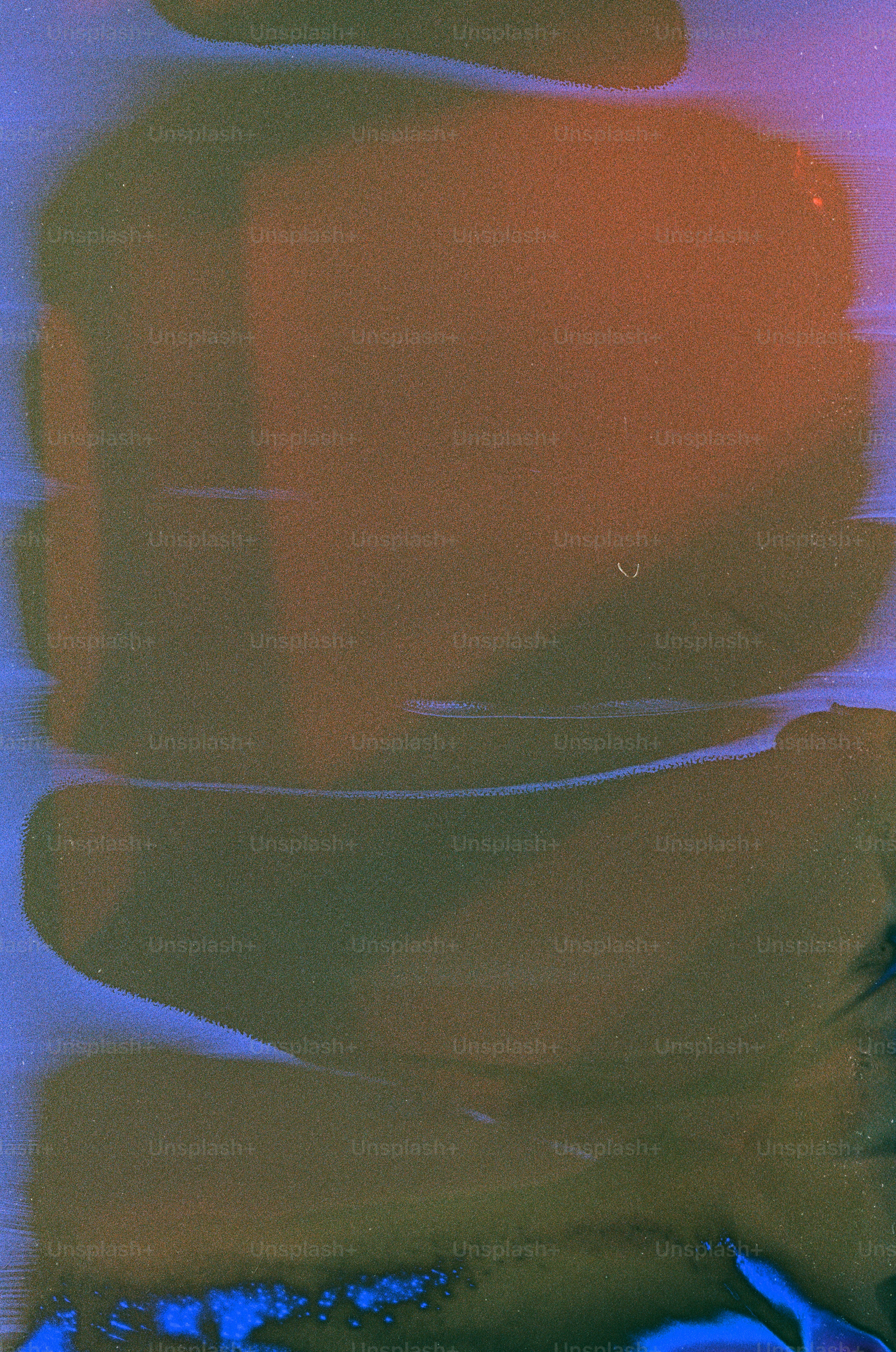 Abstract blend of blue, orange, and green colors