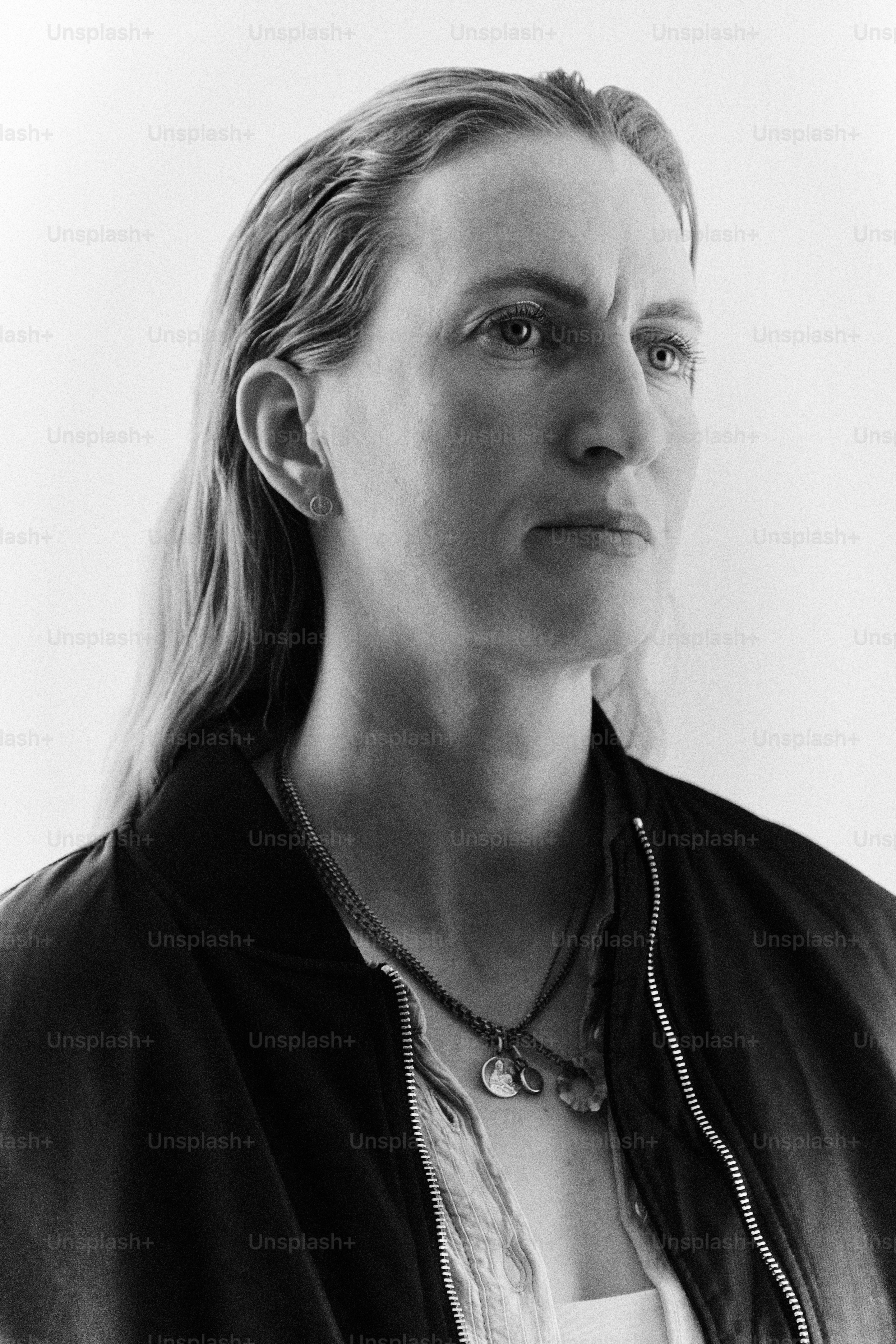 A black and white portrait of a woman
