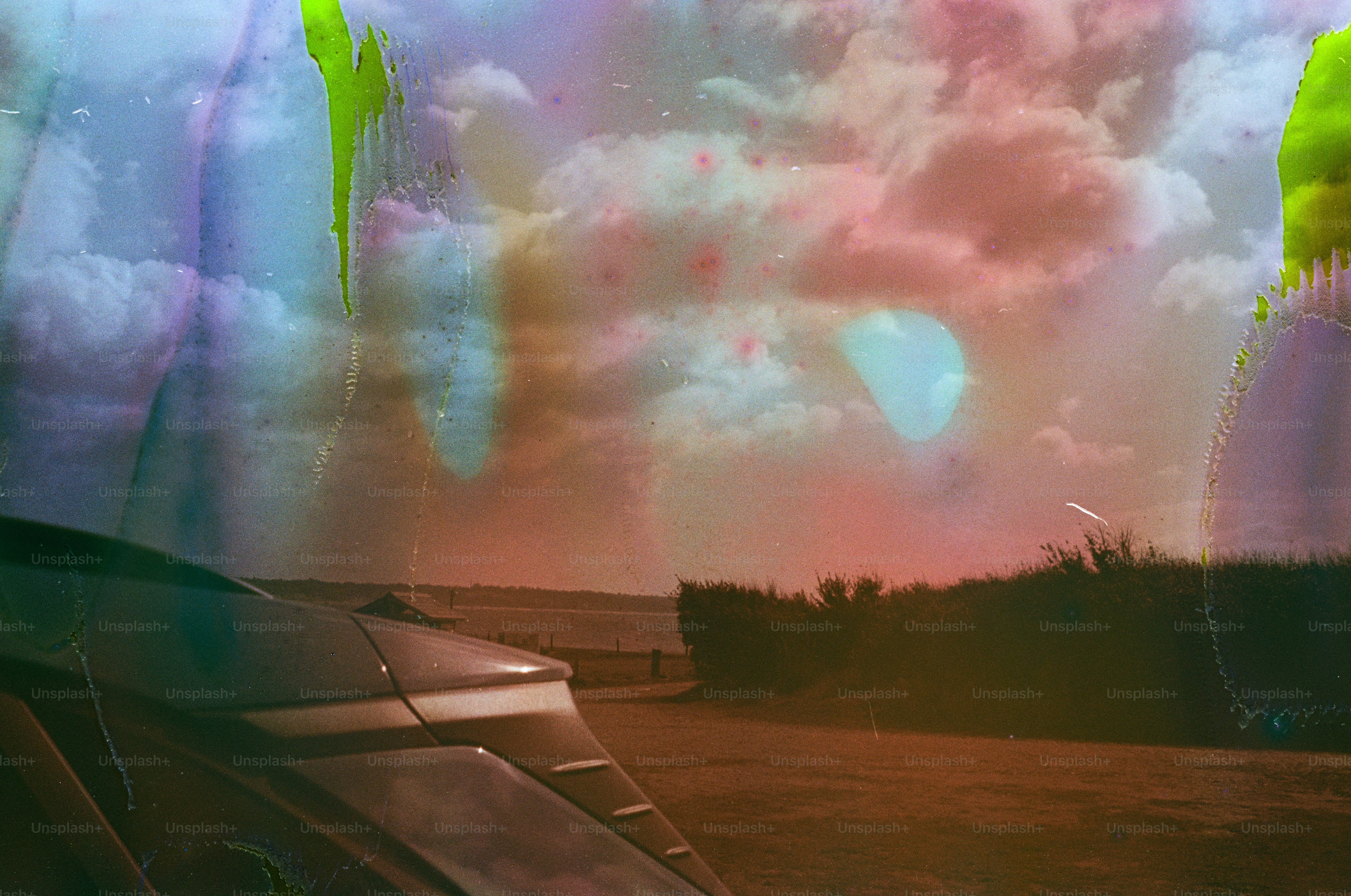 Abstract landscape with colorful sky and rolling hills photo – Abstract ...