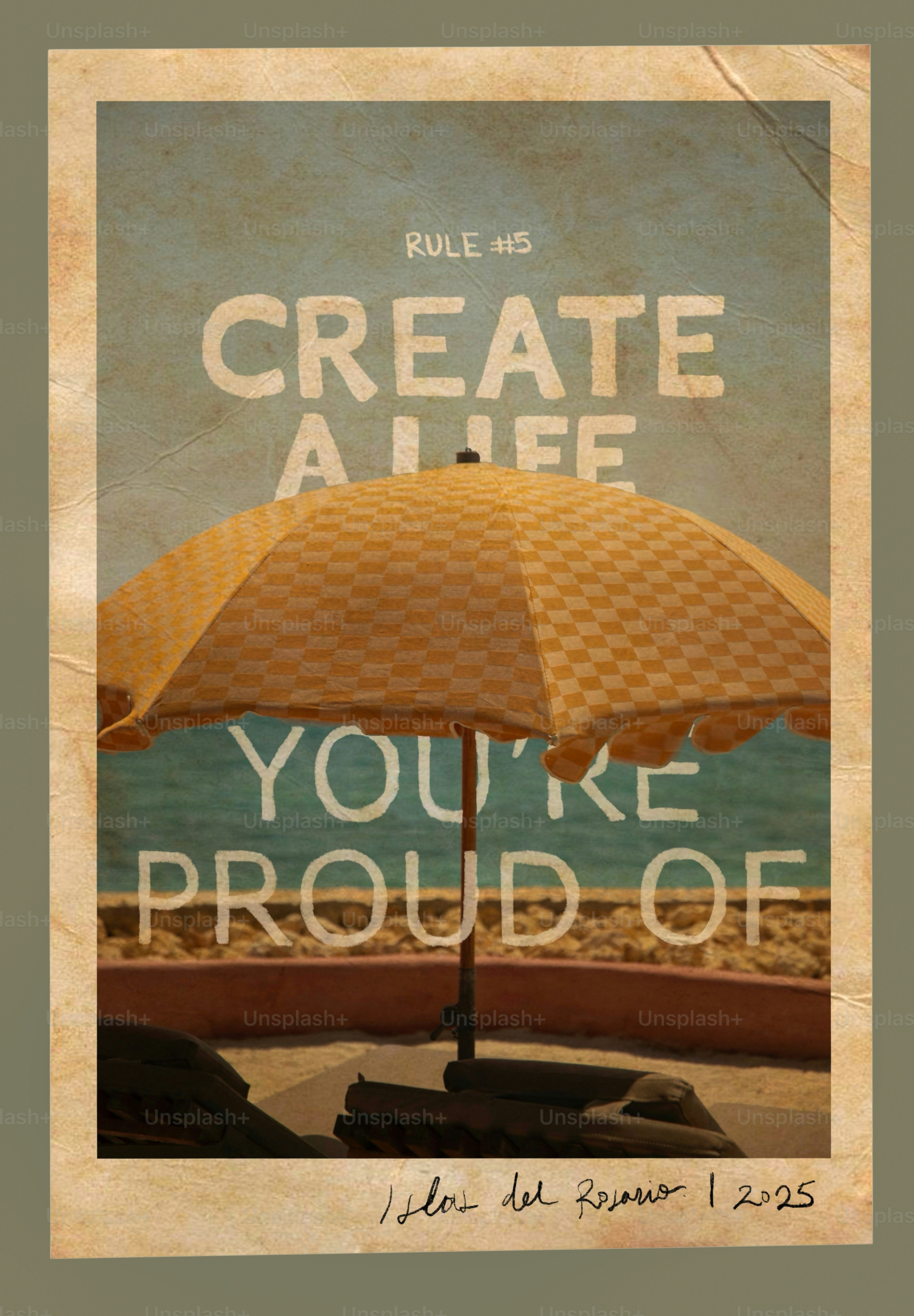 Yellow umbrella on a sunny beach with inspirational quote.