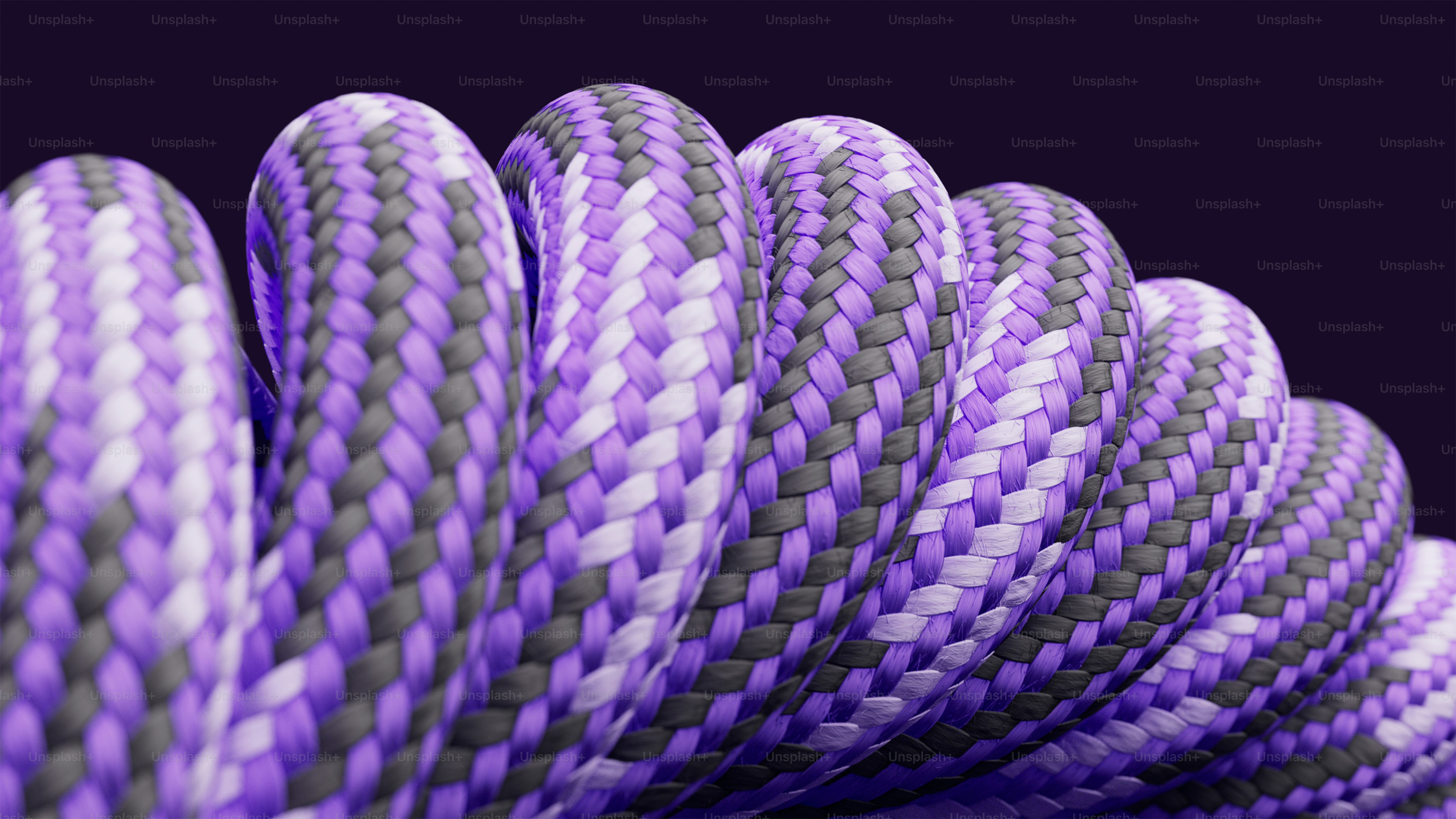 Close-up of a braided purple and gray cord