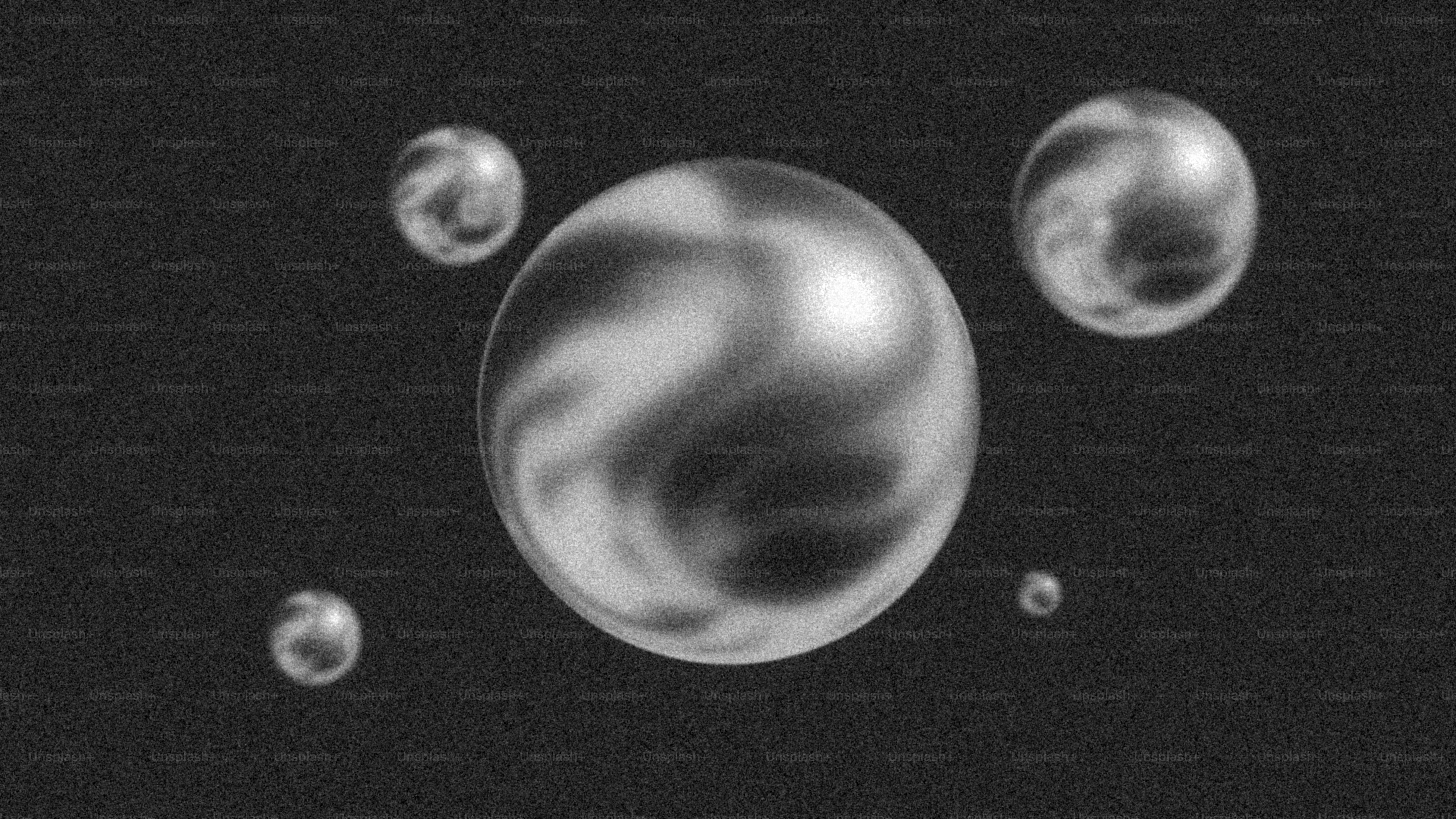 Several reflective spheres floating in dark space photo – Abstract ...
