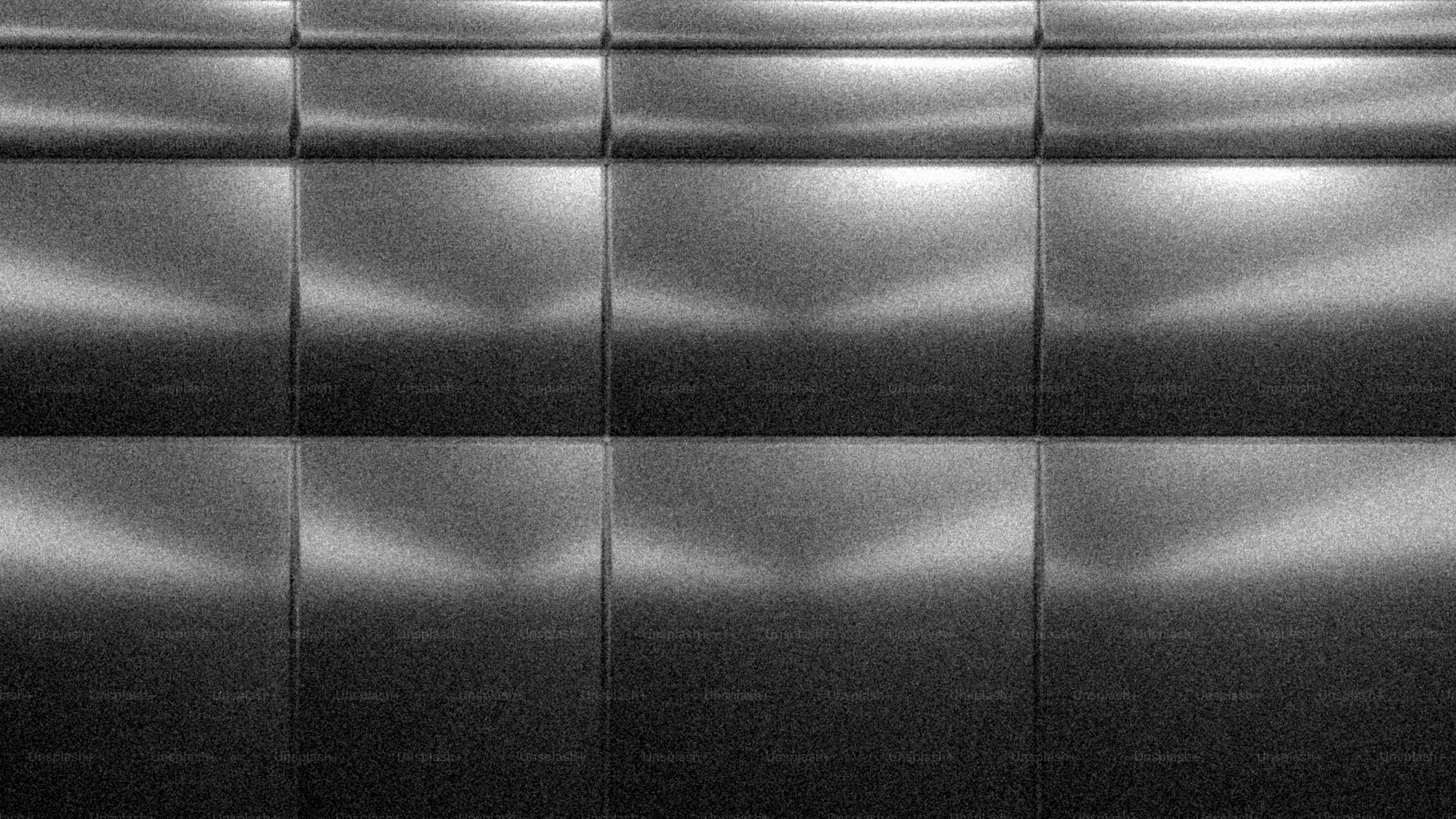 Textured metallic wall with reflective surfaces photo – Wallpaper Image ...