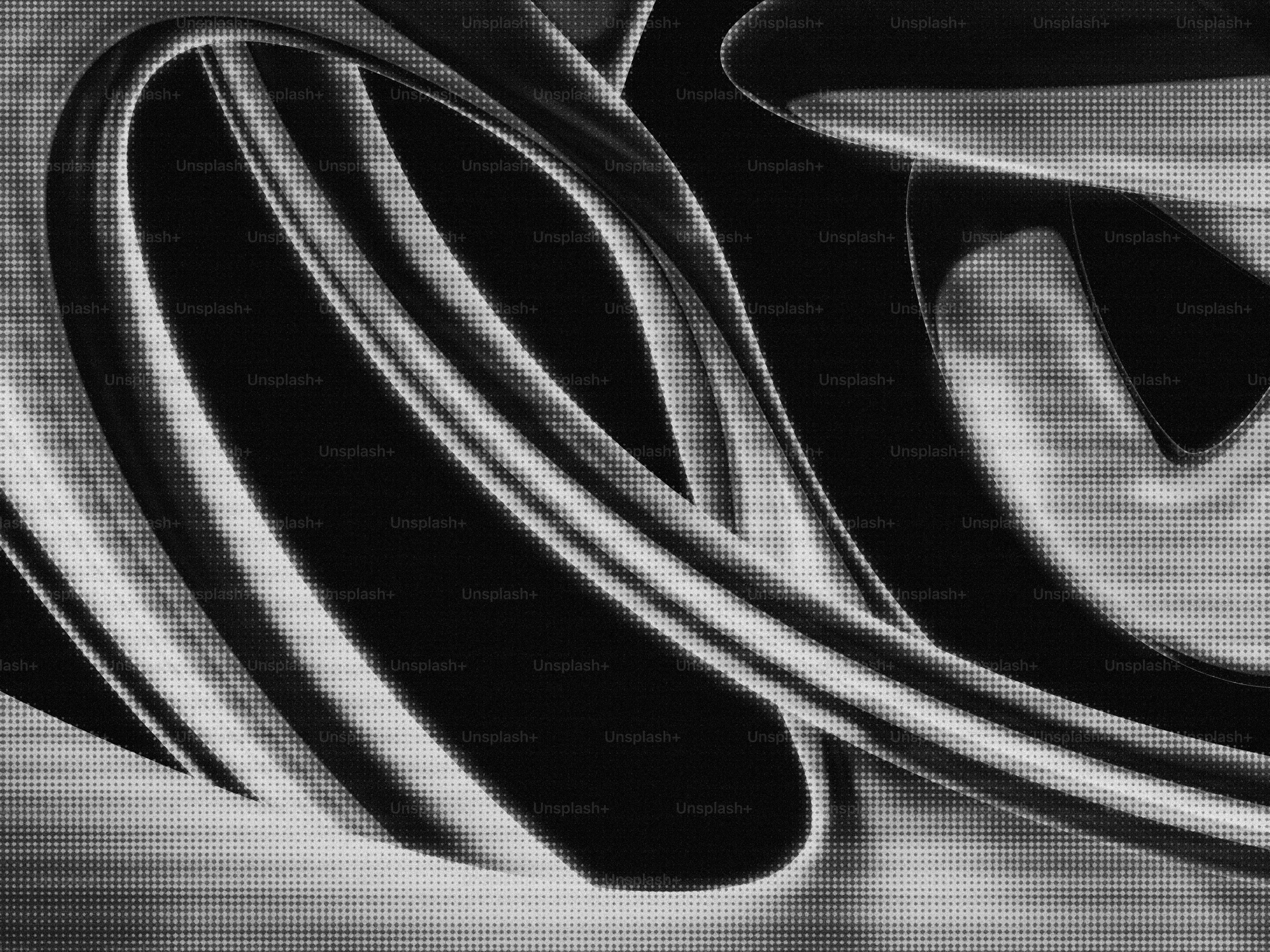 Abstract black and white swirling shapes