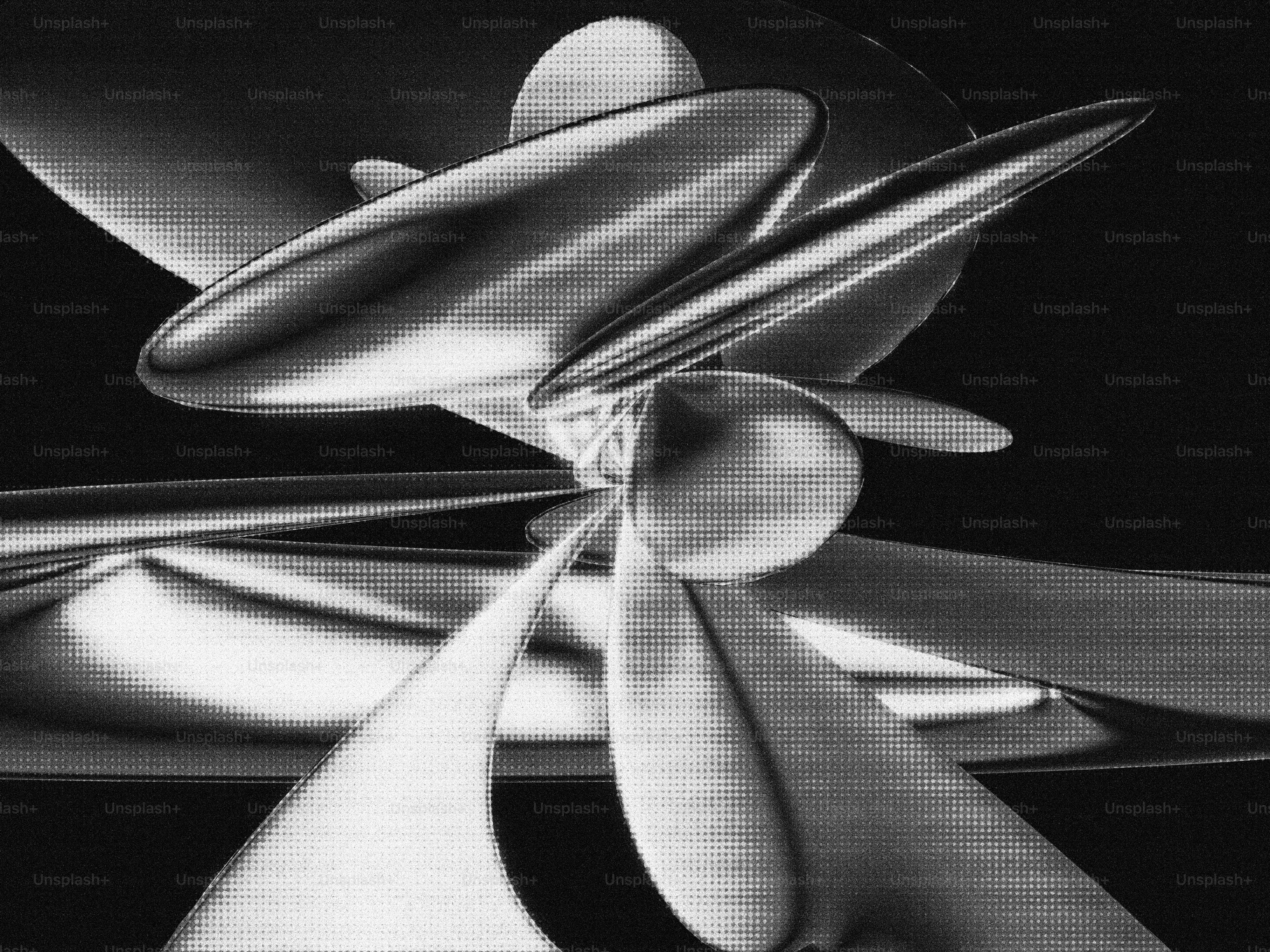 Abstract metallic sculpture with swirling shapes