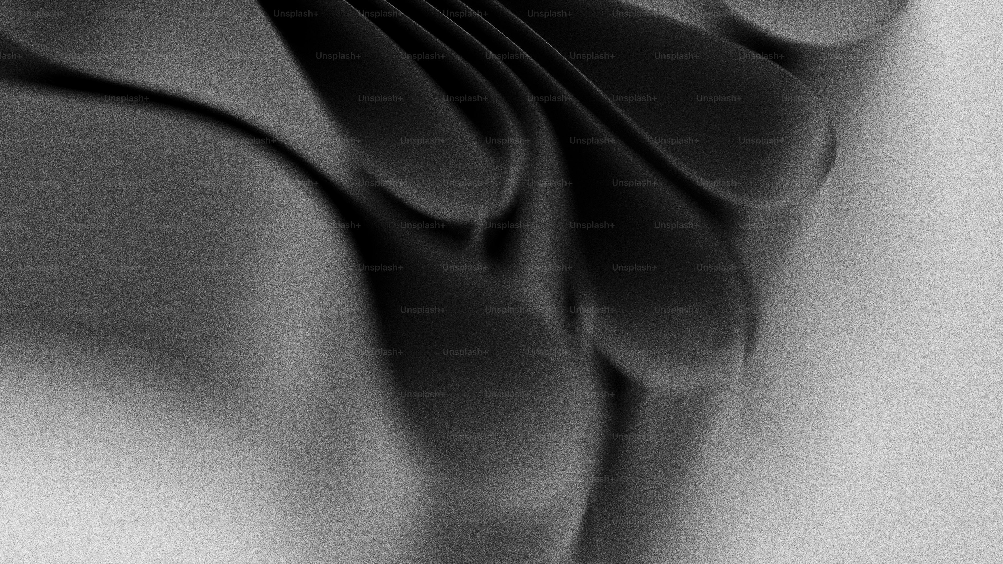 Abstract black and white curves of paper