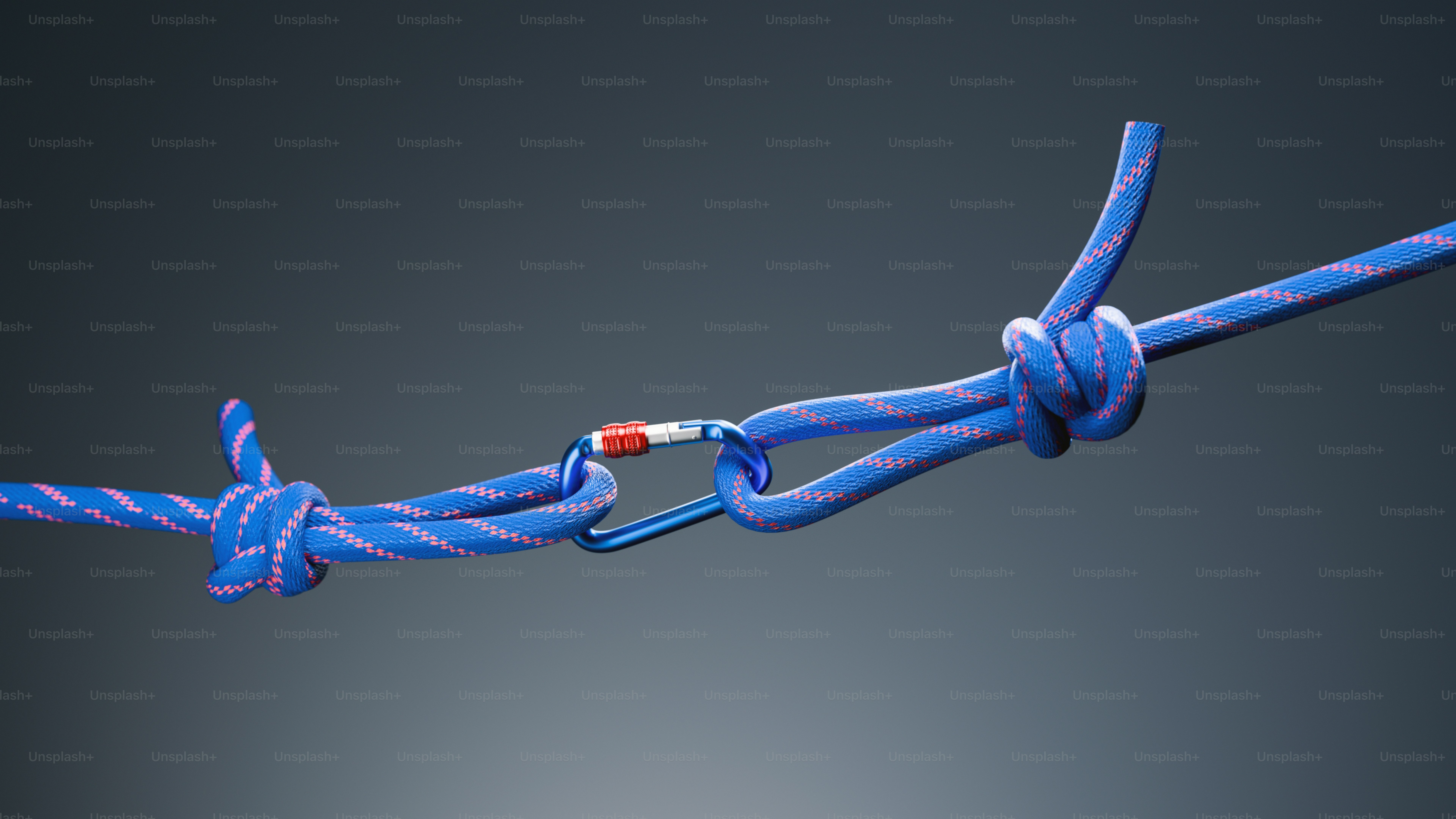 회색 배경에 카라비너로 묶인 파란색 밧줄