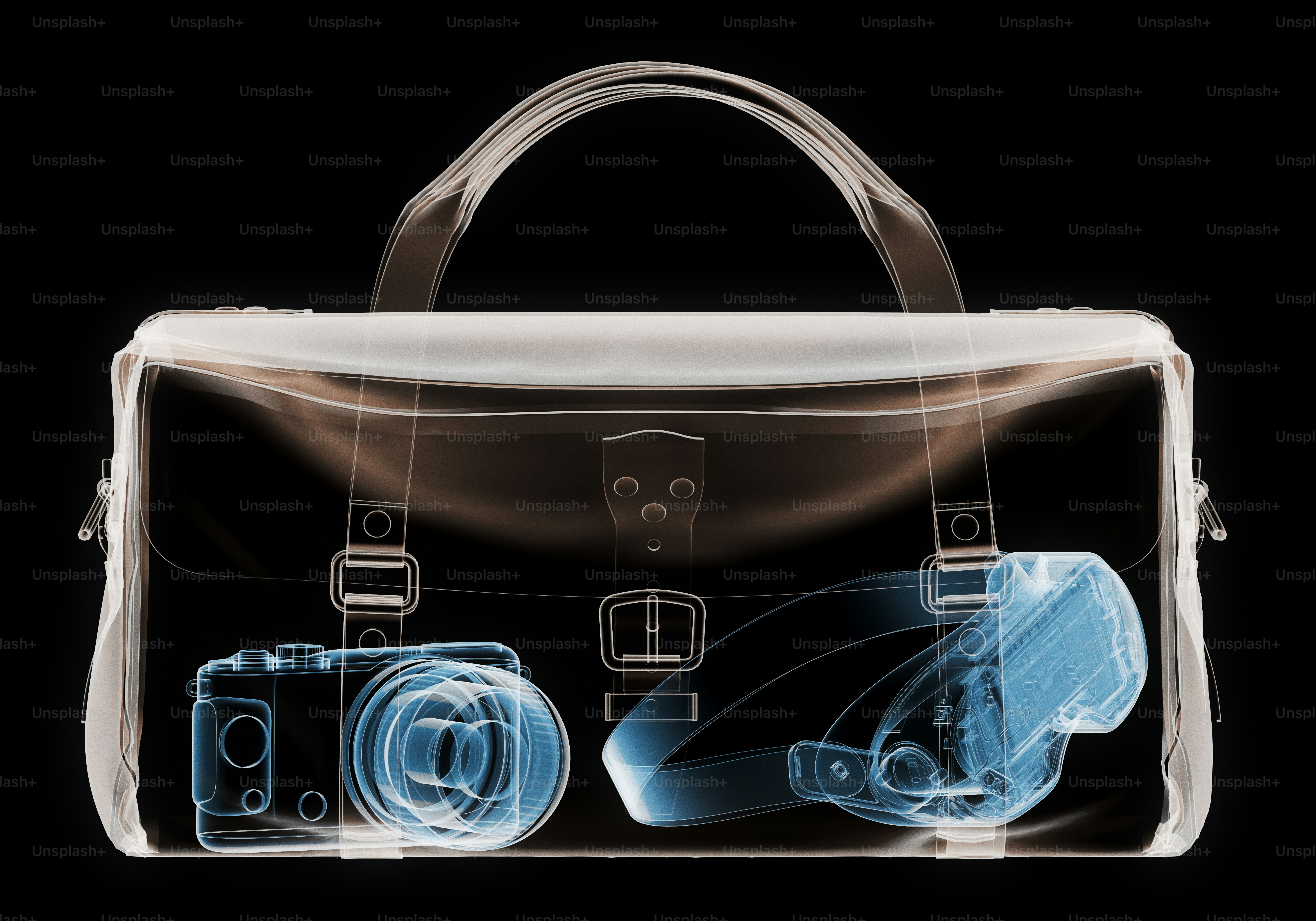 X-ray of a bag with camera and goggles inside contents