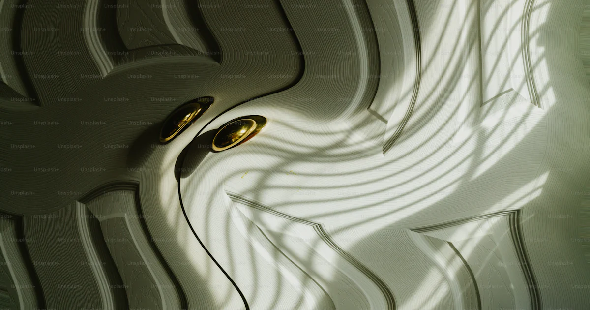 Distorted shadows play on a white textured surface. photo ...