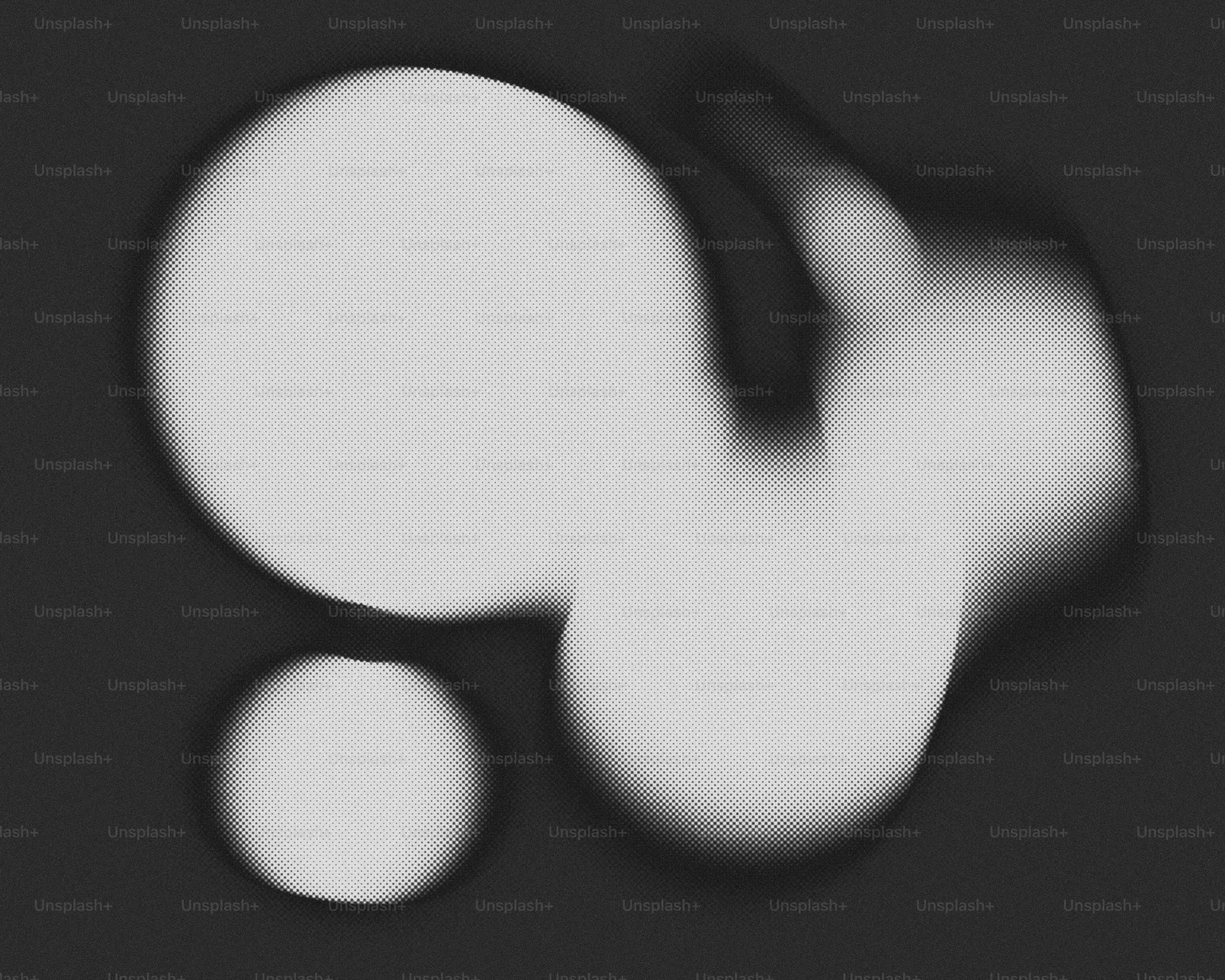 Formes blanches floues abstraites sur un fond sombre