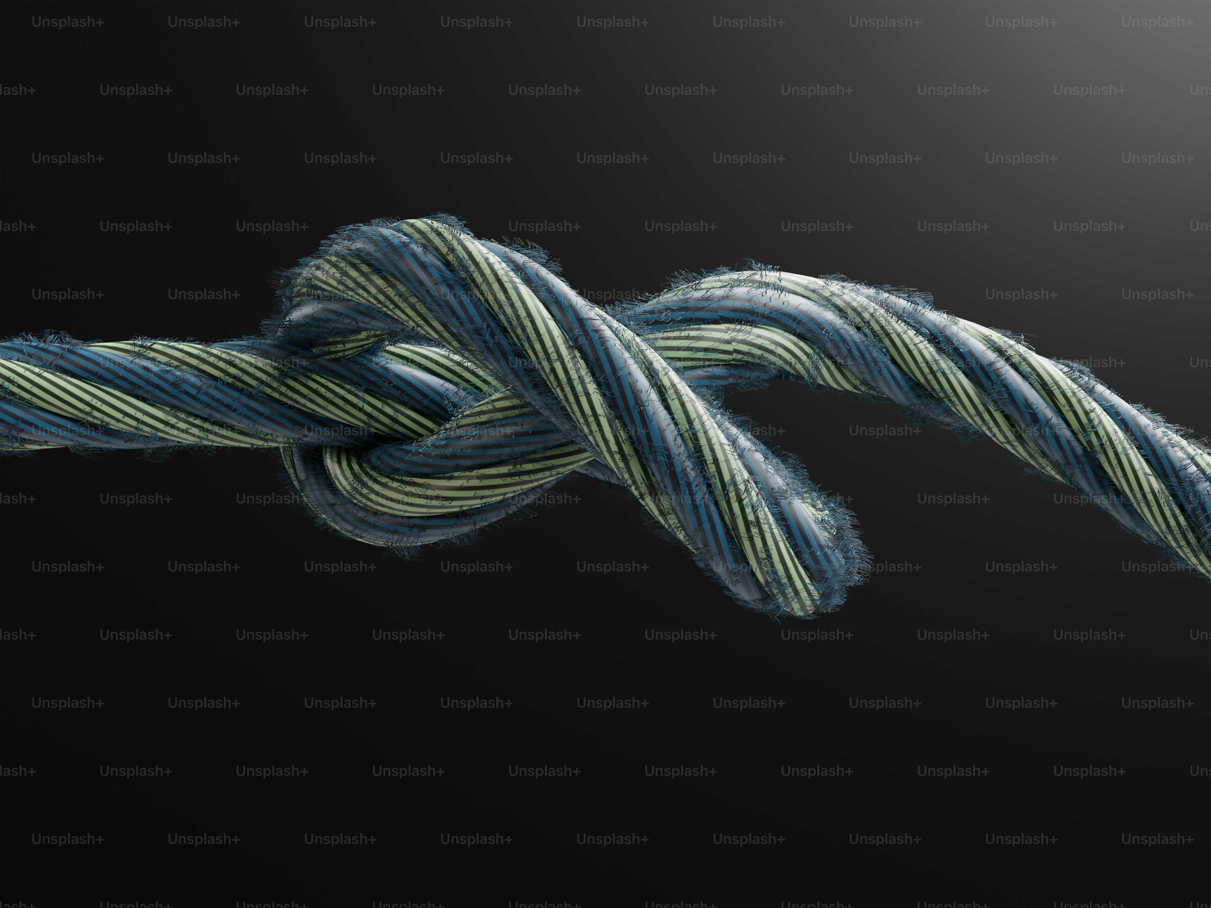 A knot tied in a blue and green rope