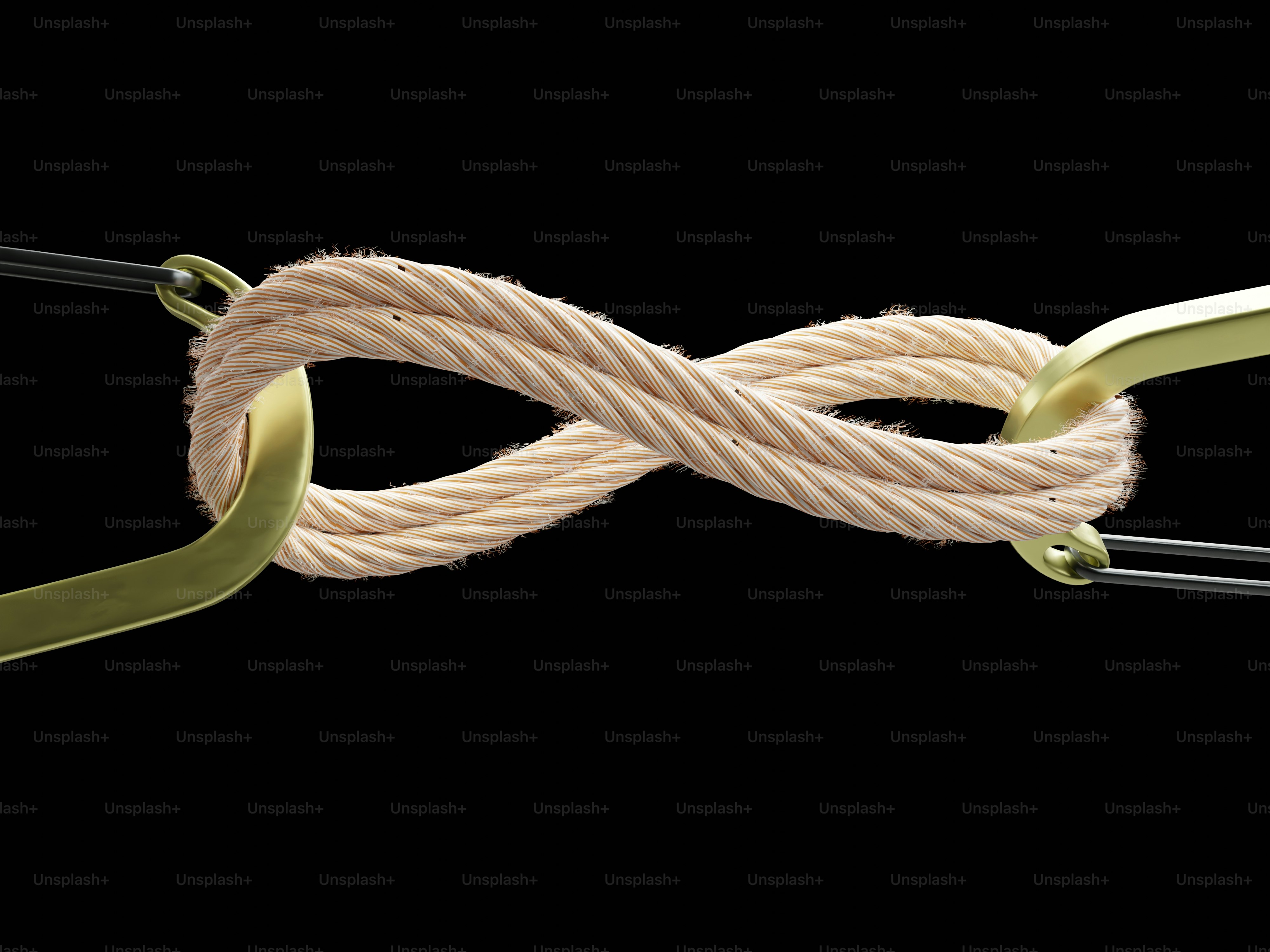 A rope tied in an infinity symbol shape. photo – Support Image on Unsplash, image size:3000x2250