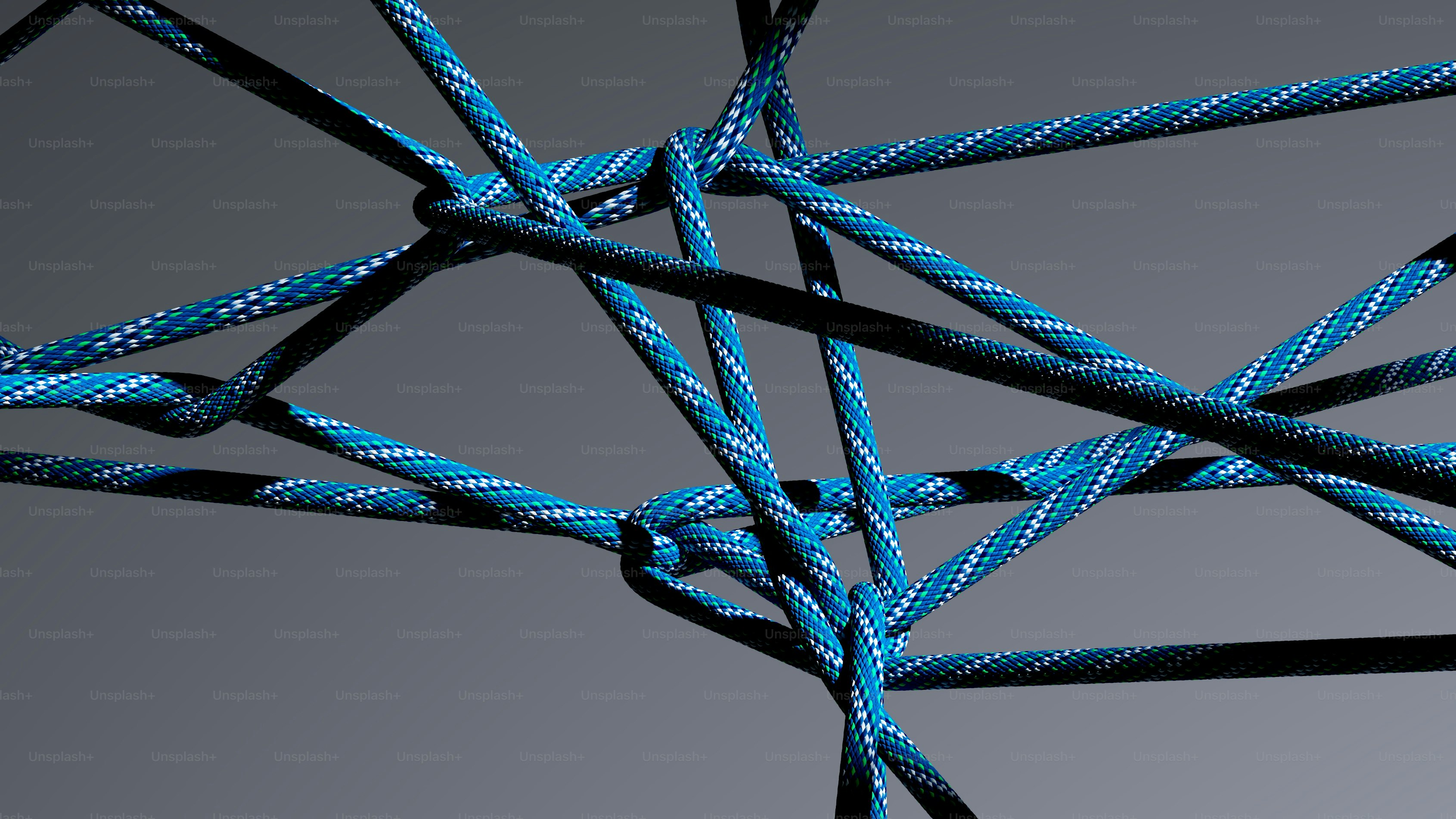 Tangled blue ropes against a gray background photo – Wallpaper Image on ...
