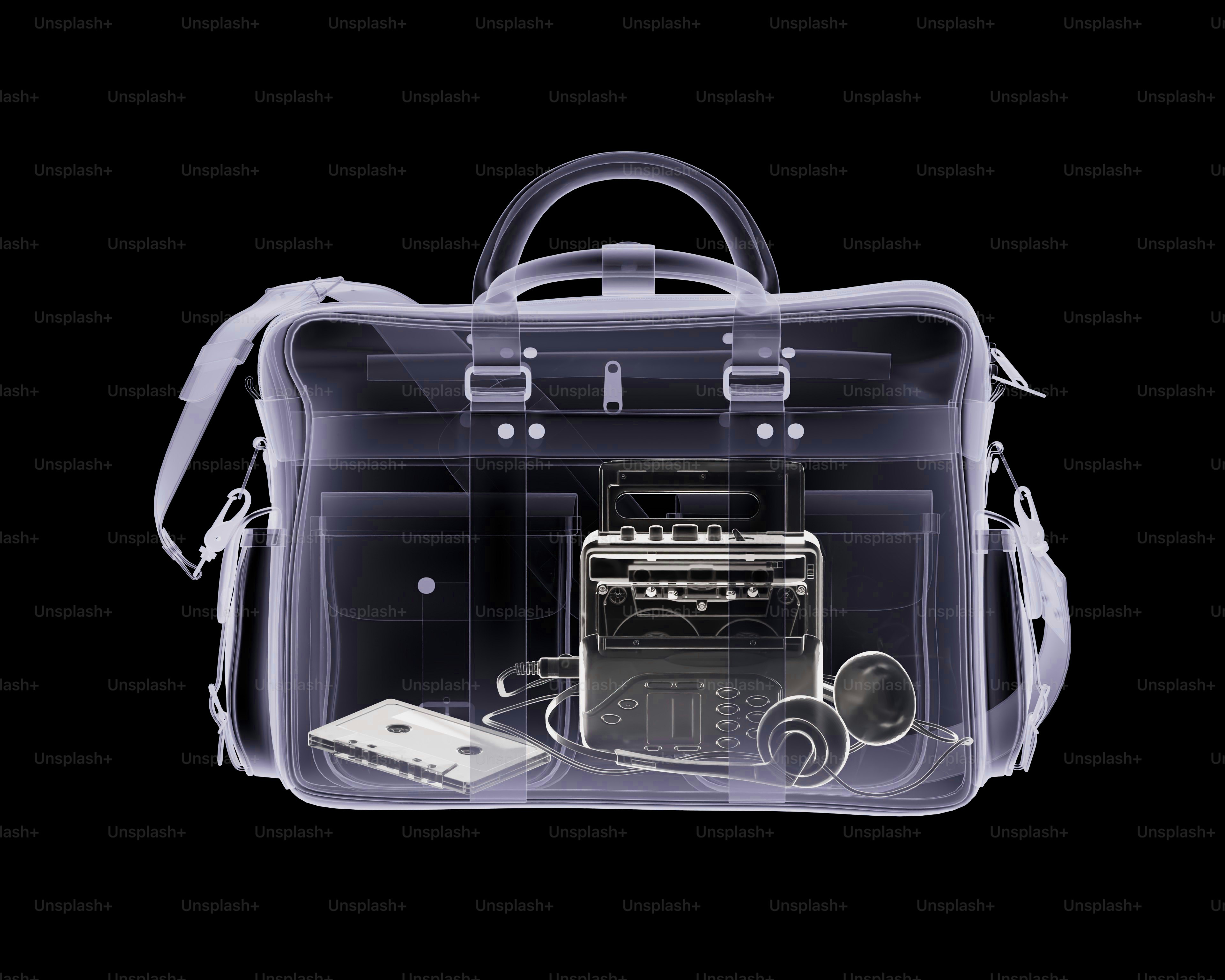 X-ray of a briefcase with electronics and cassette tape